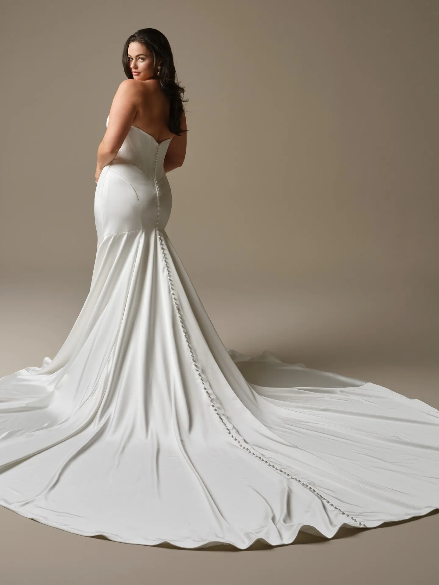 Maggie Sottero Sinclaire cat eye sheath dress, back view with button detail.