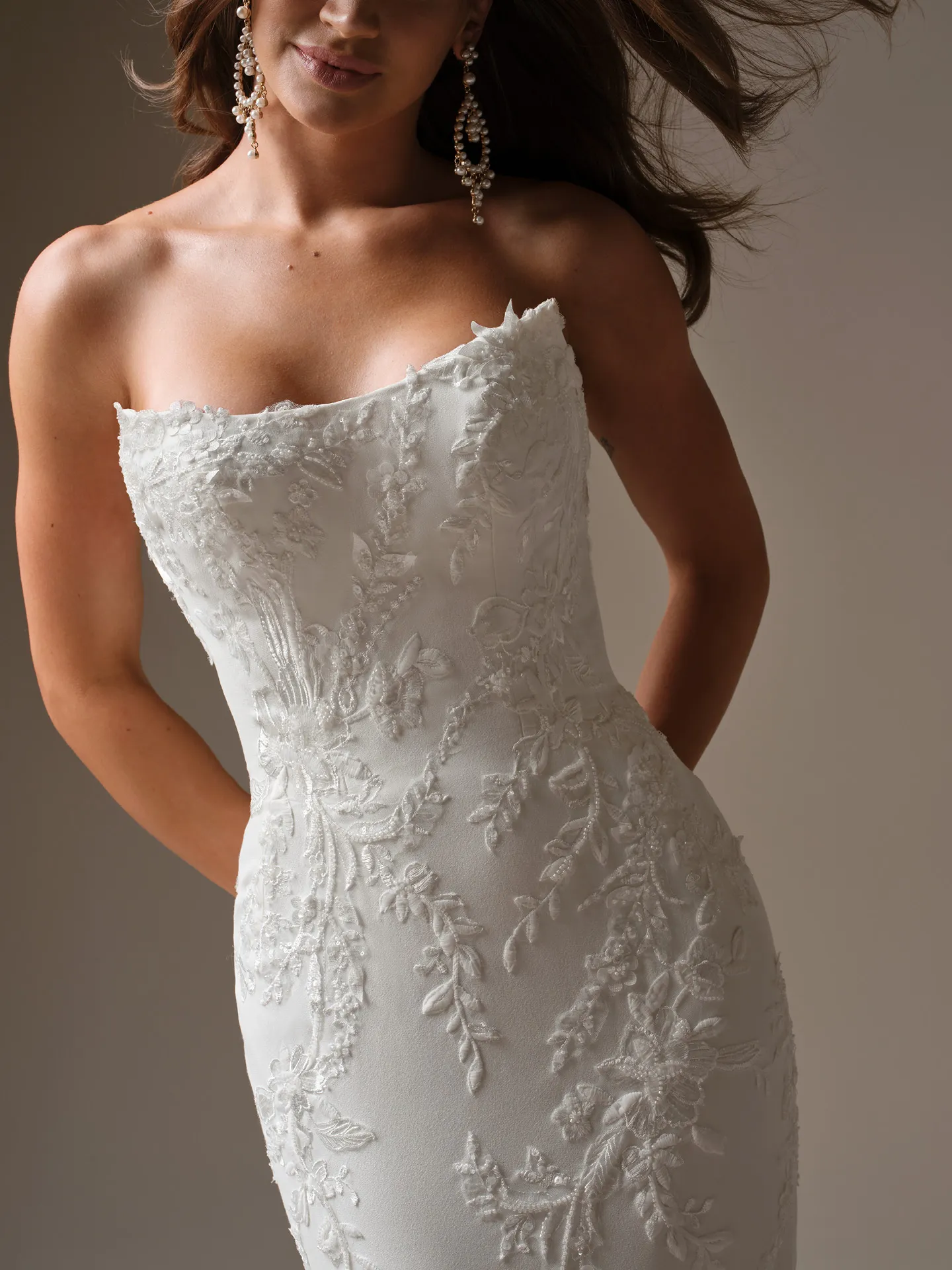 Maggie Sottero Thera, front view lace fit-and-flare wedding dress.