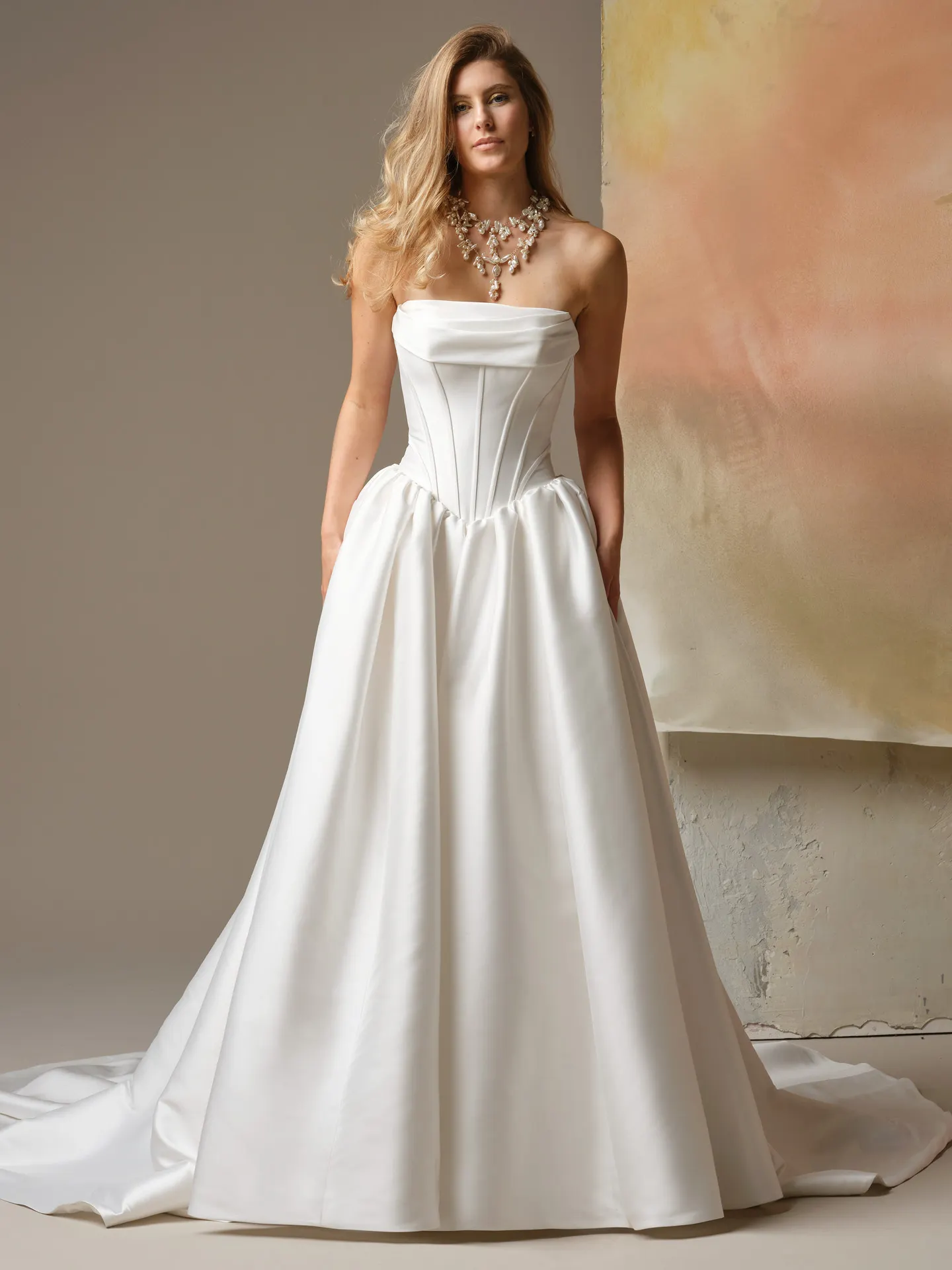 Maggie Sottero Yuma ballgown, front view with cowl neck and basque waist by Maggie Sottero.