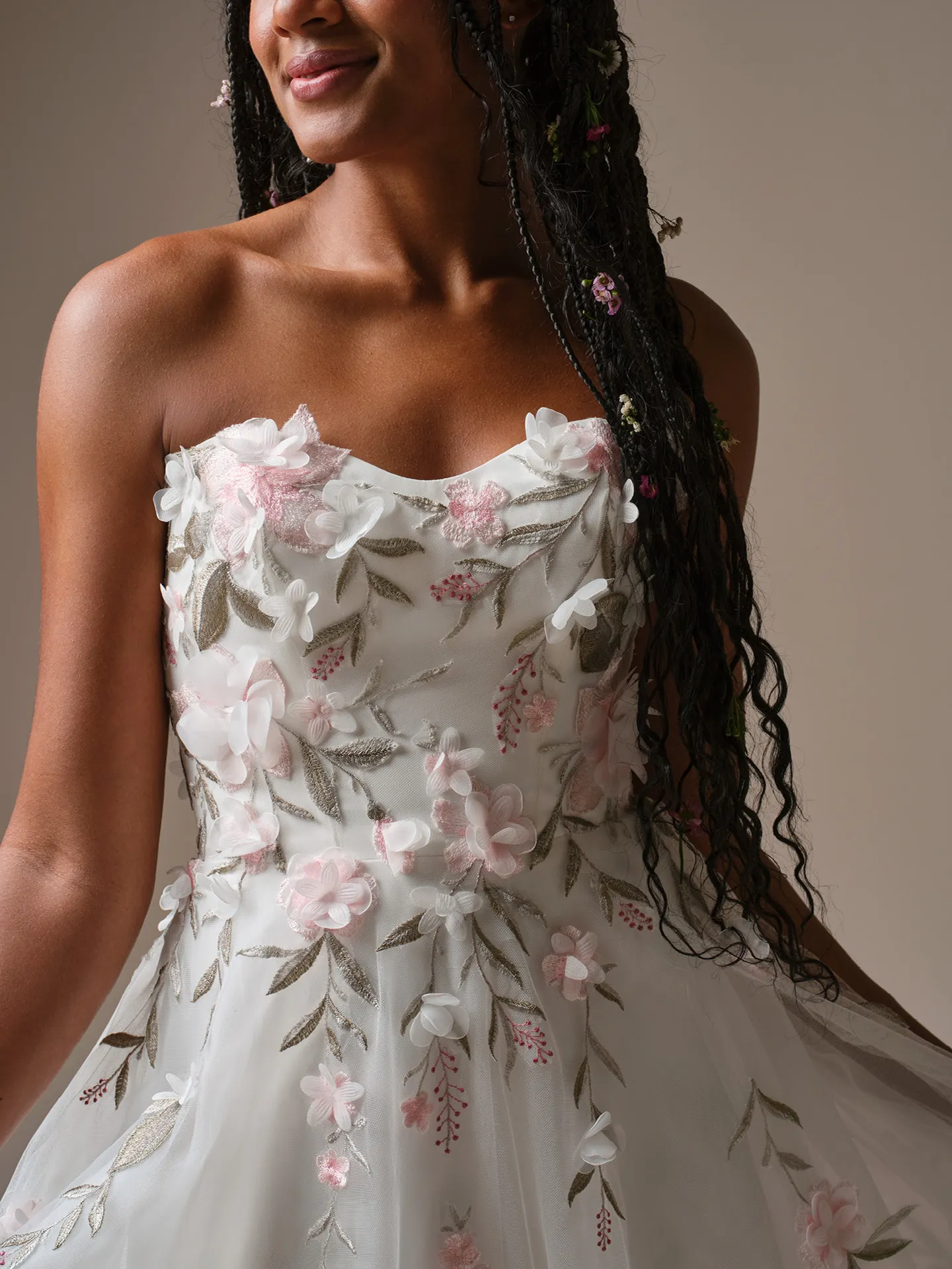Rebecca Ingram Blossom, front view 3-D floral lace strapless A-line wedding dress.
