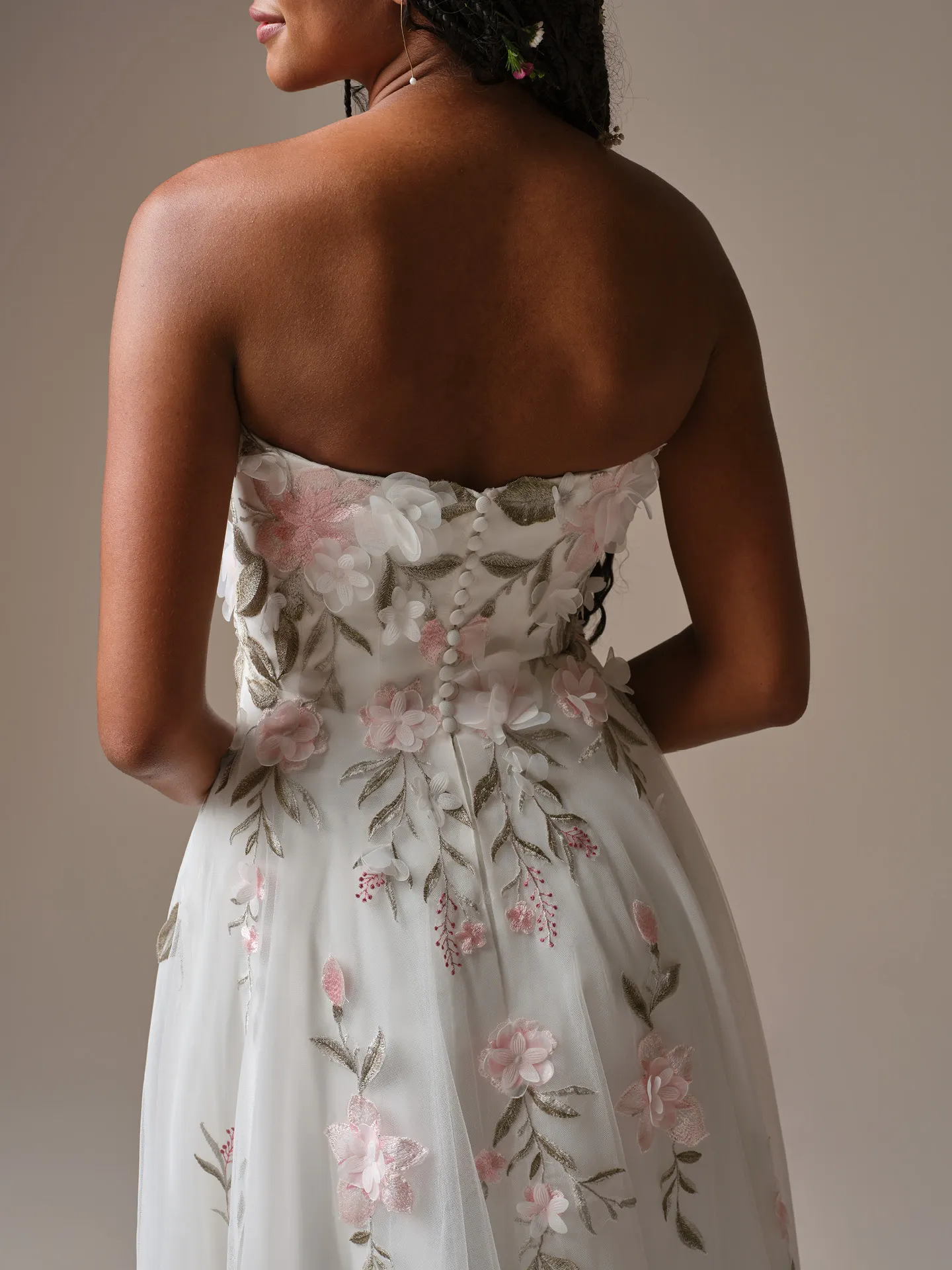 Rebecca Ingram Blossom, back view floral lace A-Line wedding dress.