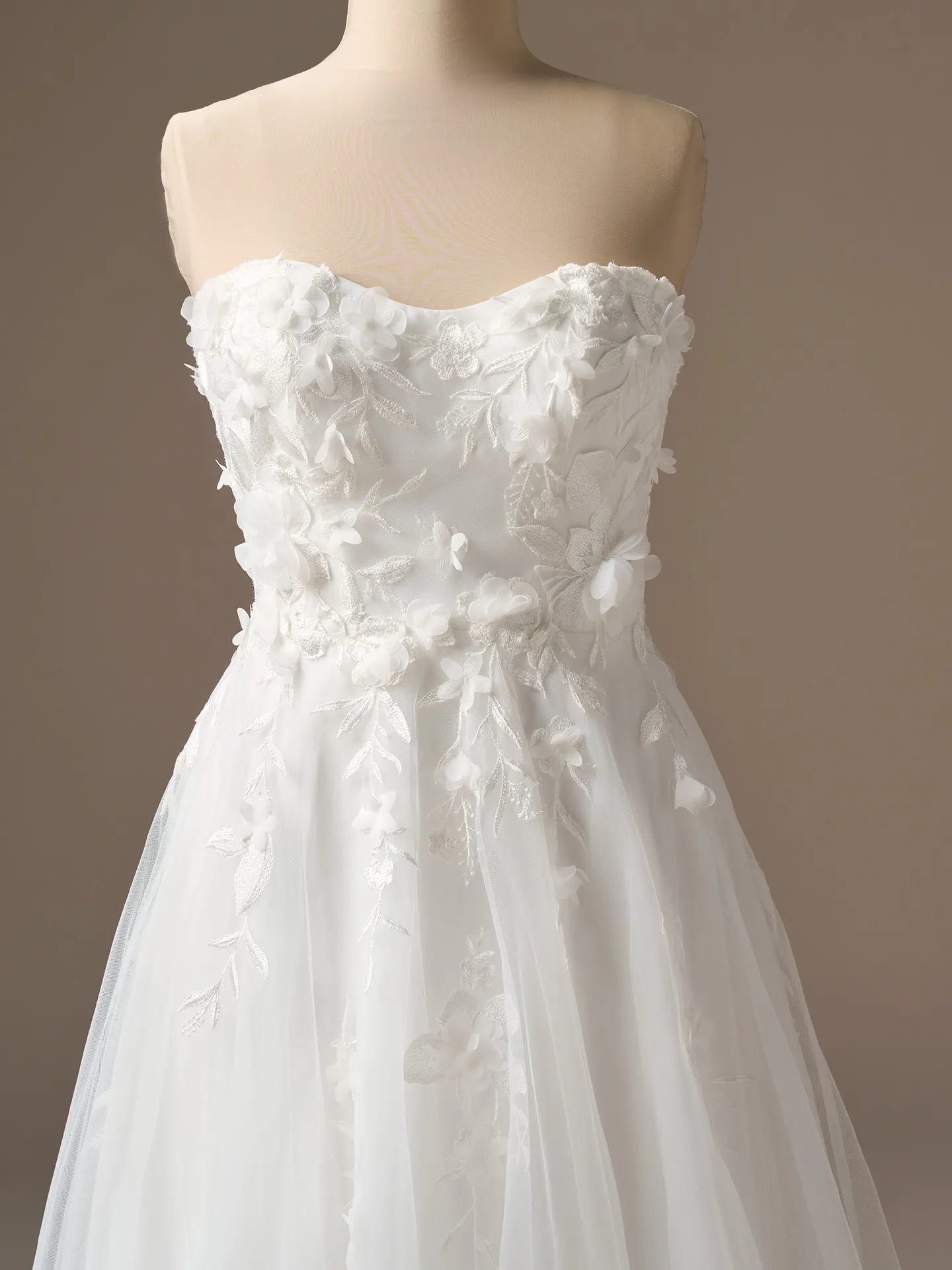 Rebecca Ingram Blossom strapless floral lace A-Line wedding dress, front view.