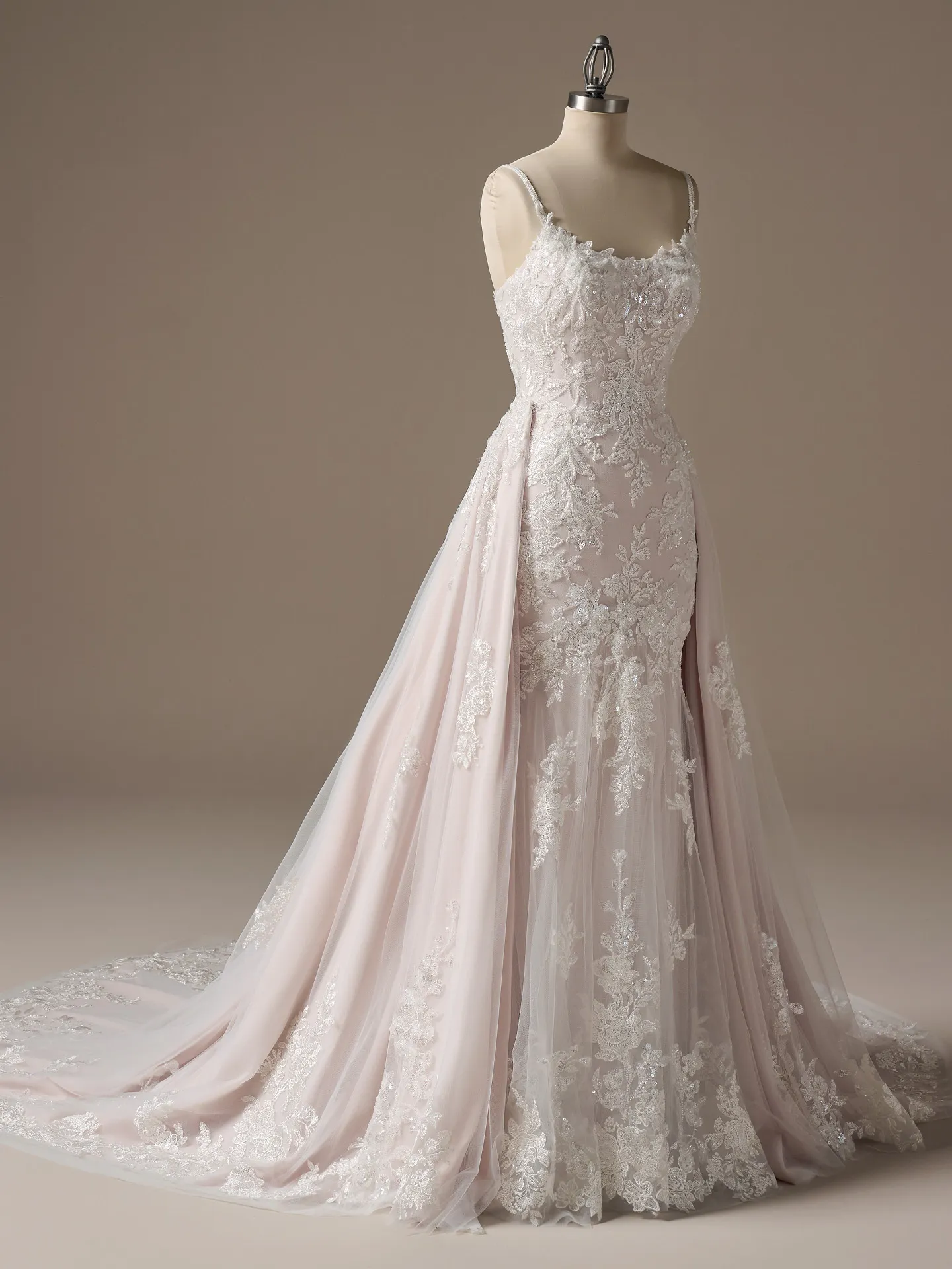 Rebecca Ingram Eden fit-and-flare dress on mannequin, front view with lace details and train