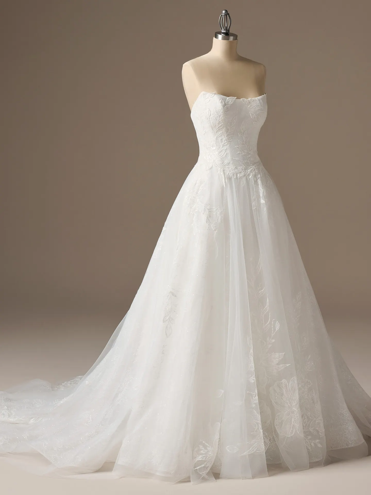 Rebecca Ingram Lisa front view lace ballgown wedding dress on a mannequin