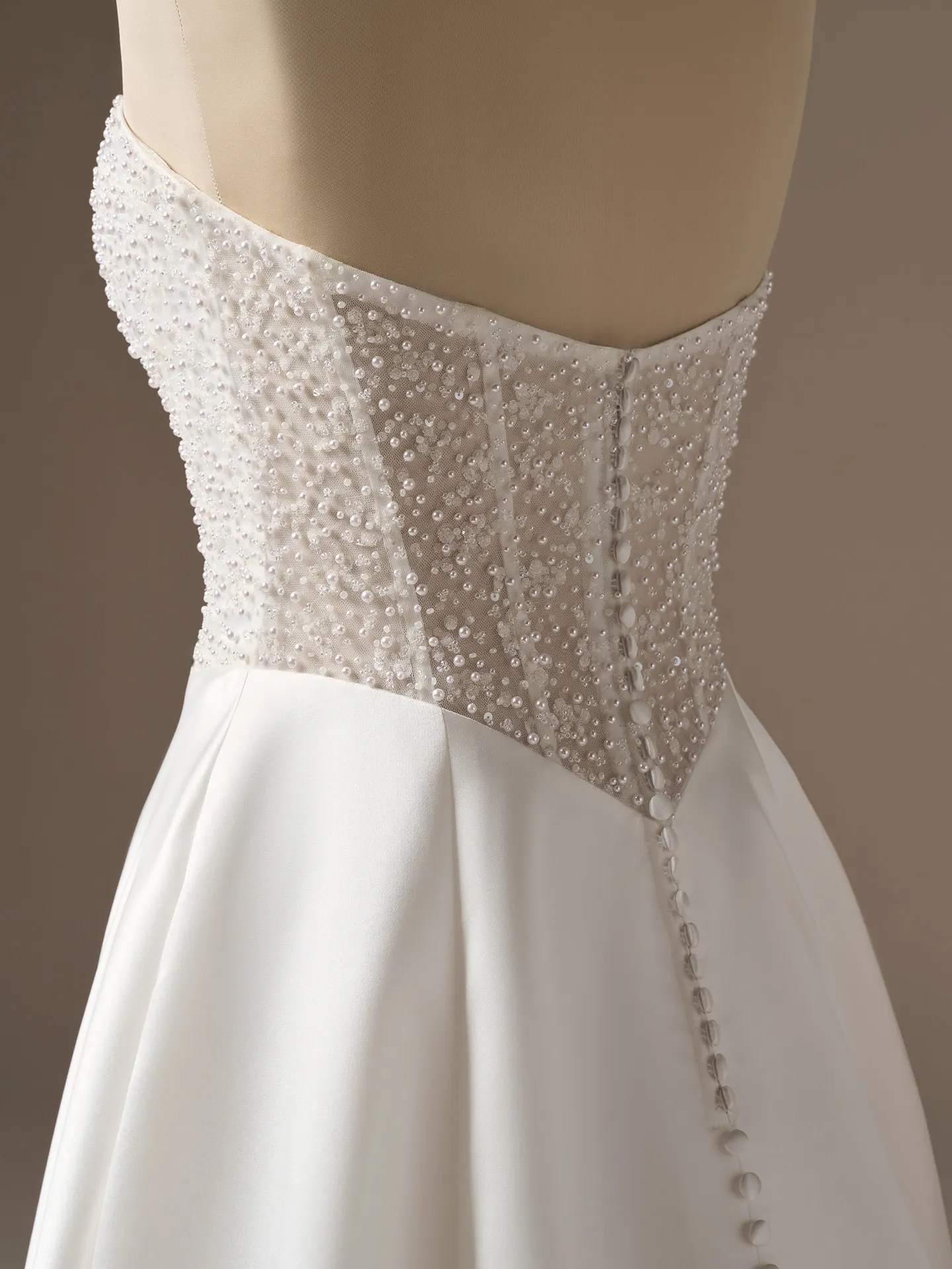 Rebecca Ingram Marty side view, pearl-accented sweetheart illusion bodice A-line wedding dress