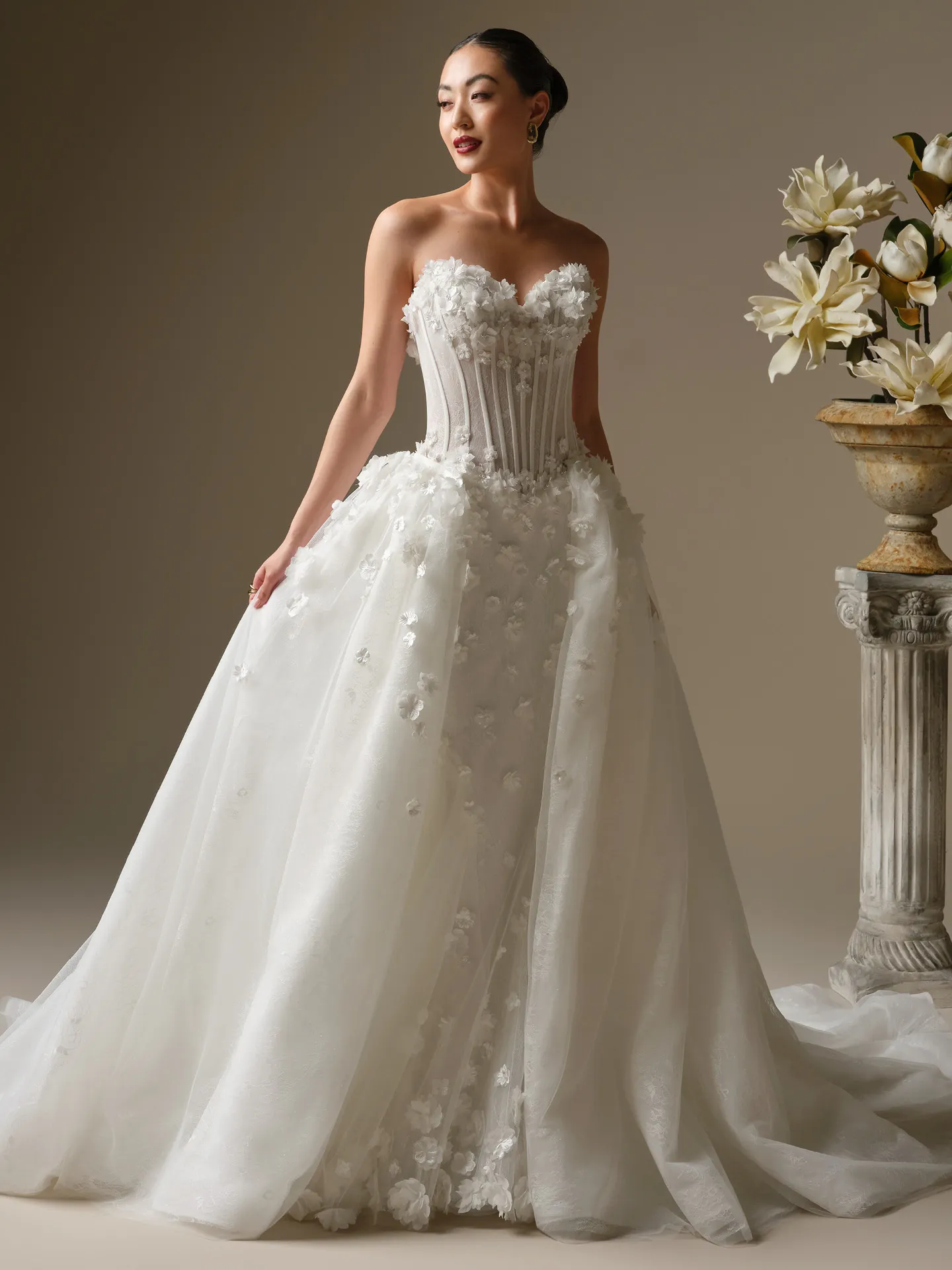 Maggie Sottero Akari, front view 3-D flower fit-and-flare wedding dress.