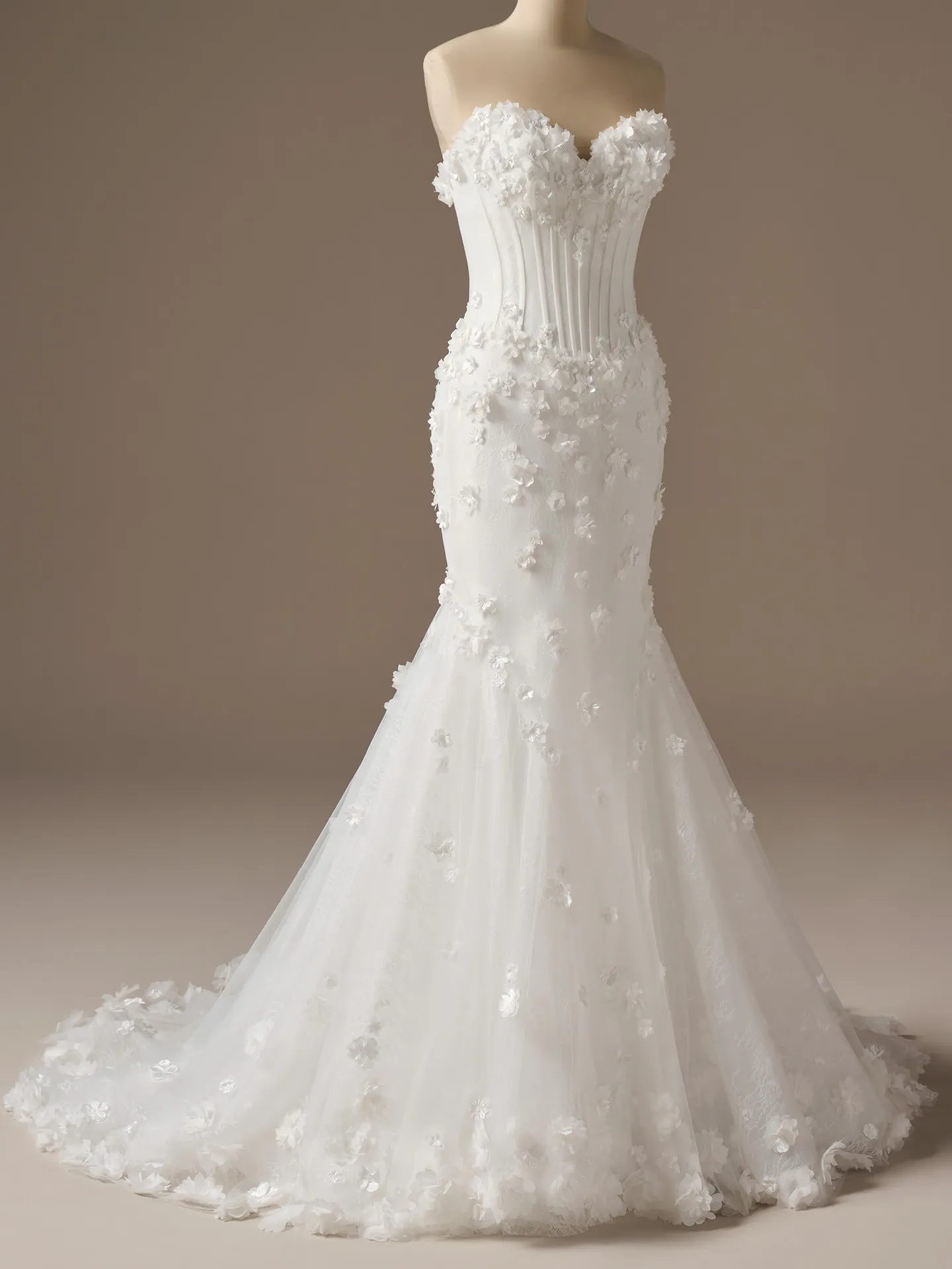 Maggie Sottero Akari, front view fit-and-flare wedding dress with 3-D flowers.
