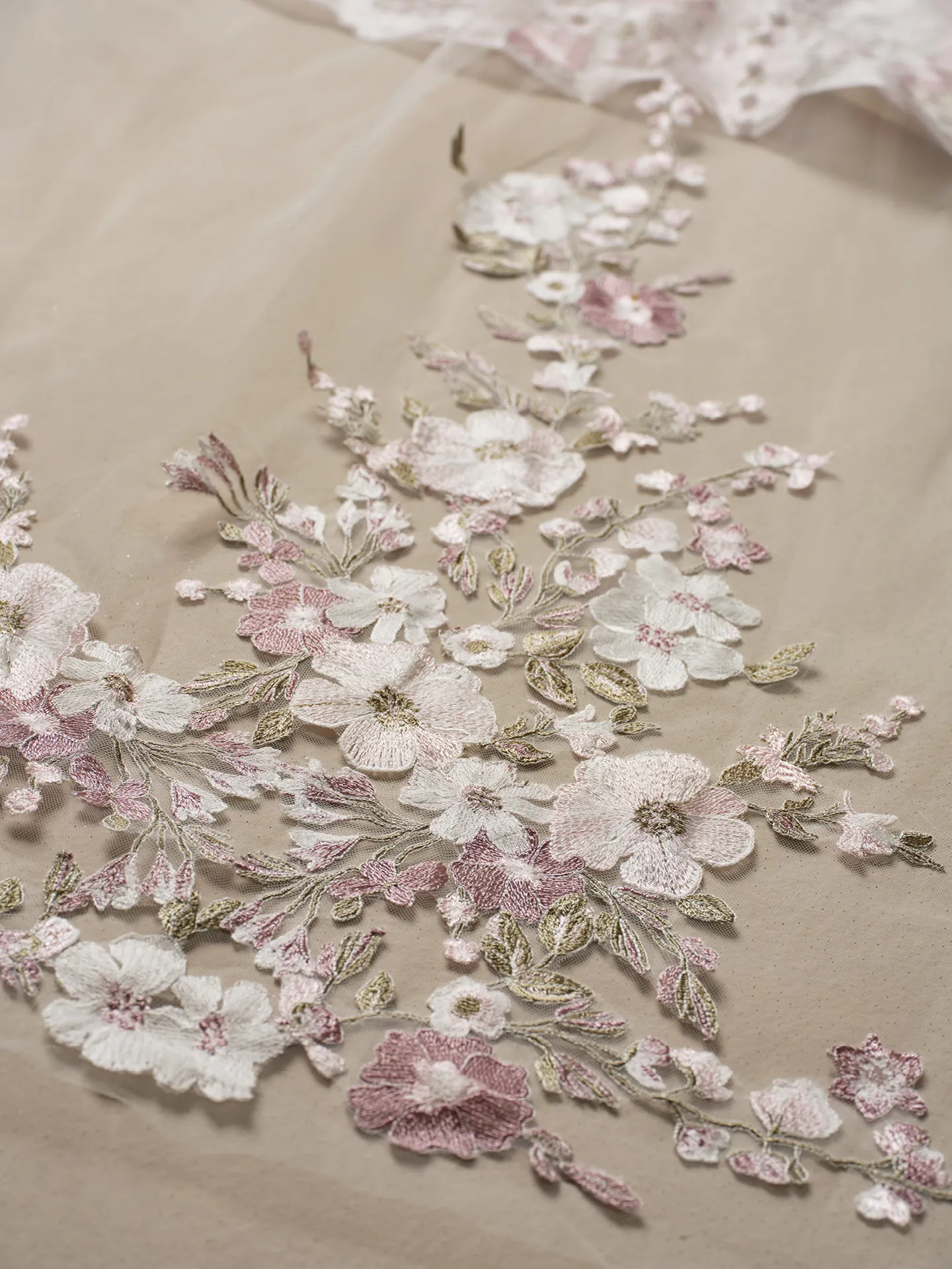 Maggie Sottero Floral embroidery detail on Sottero and Midgley Alvarez wedding dress.