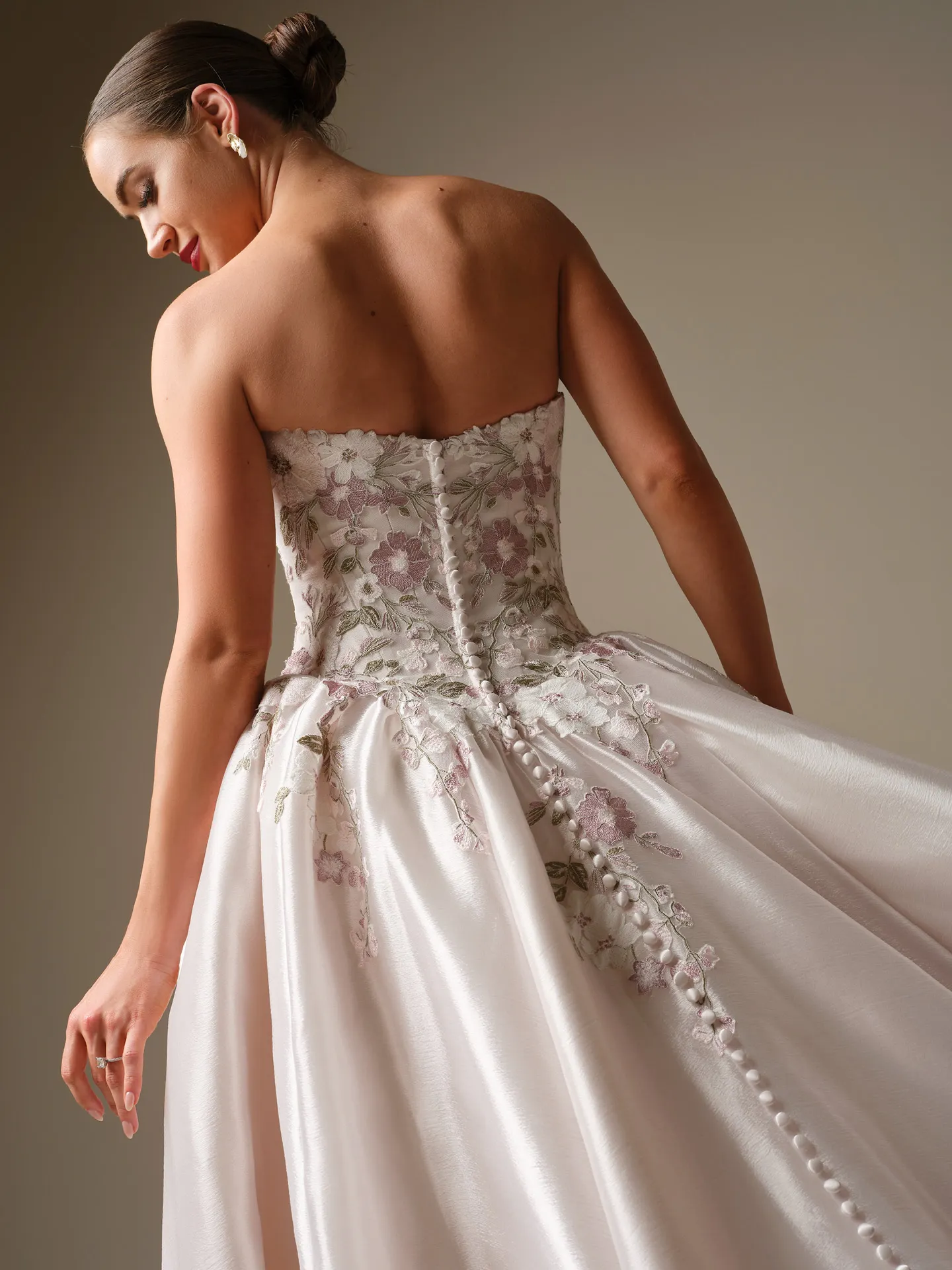 Maggie Sottero Alvarez floral lace ballgown, back view.