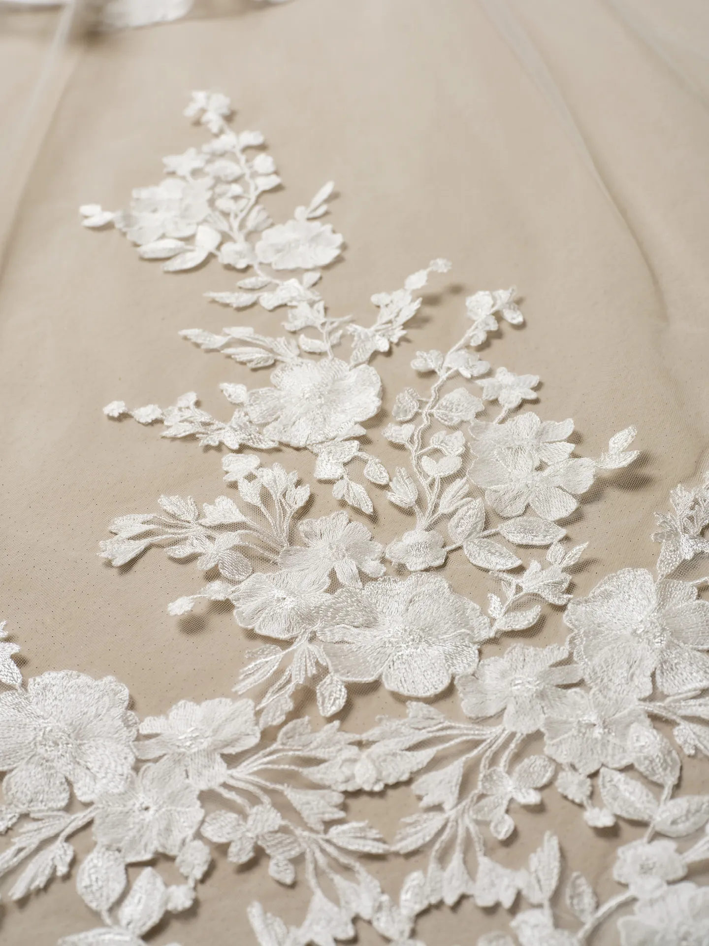 Maggie Sottero Alvarez floral lace detail on ballgown wedding dress.