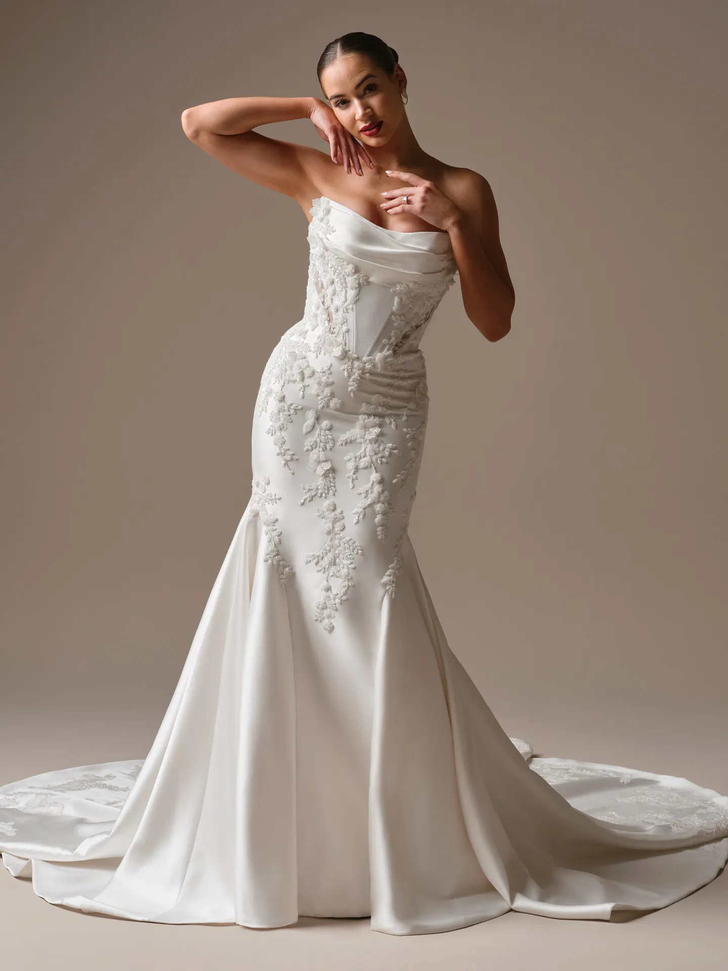 Maggie Sottero Burke beaded fit-and-flare wedding dress front view.