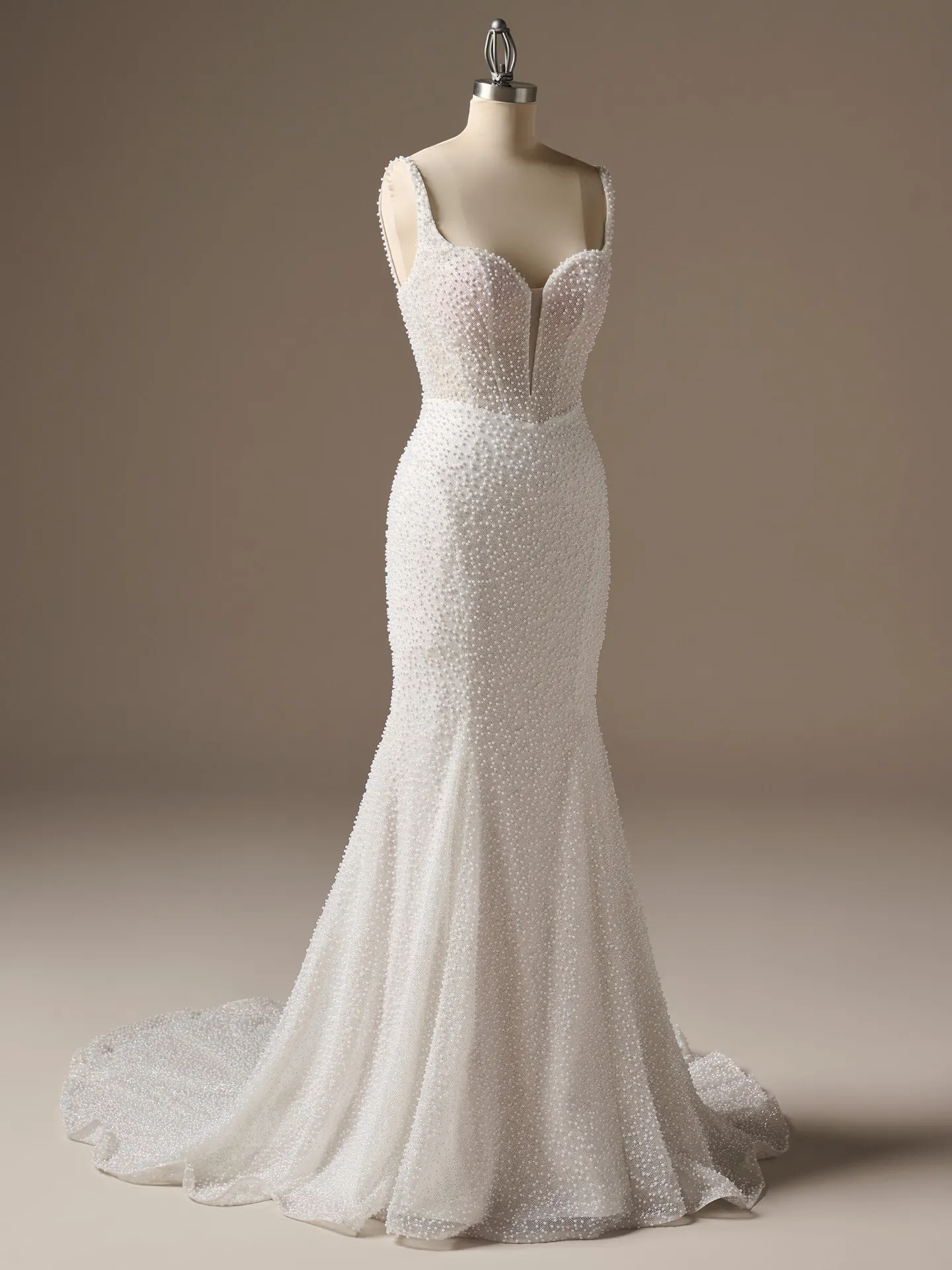 Sottero and Midgley Cooper, side view, pearl glitter tulle sheath wedding dress on mannequin.