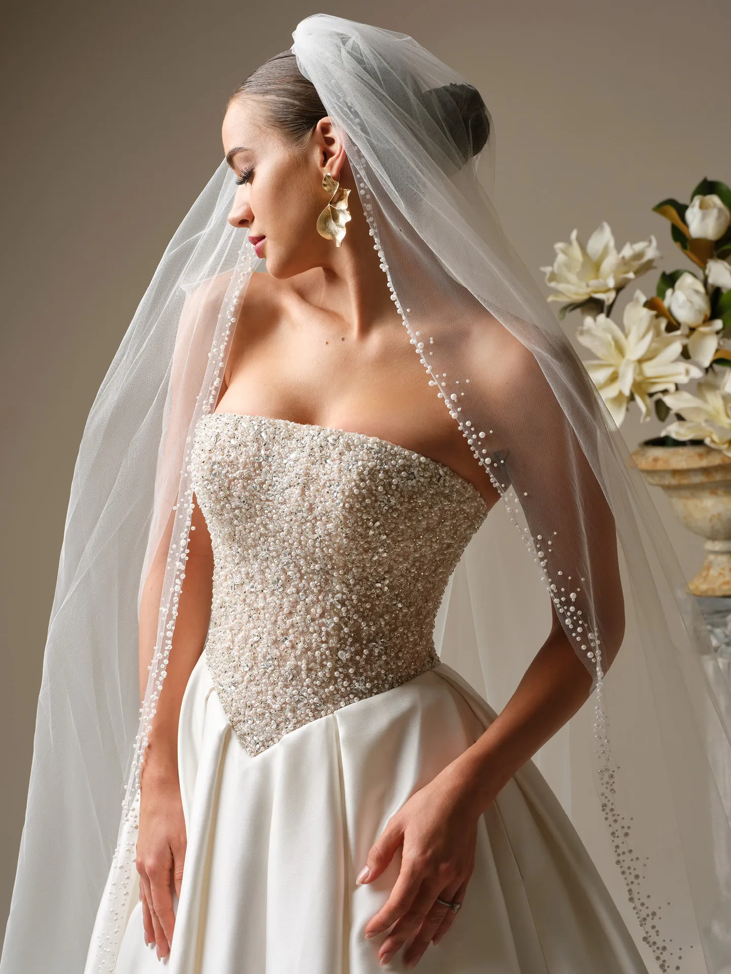 Sottero and Midgley Dmara ballgown, beaded bodice,, side view.