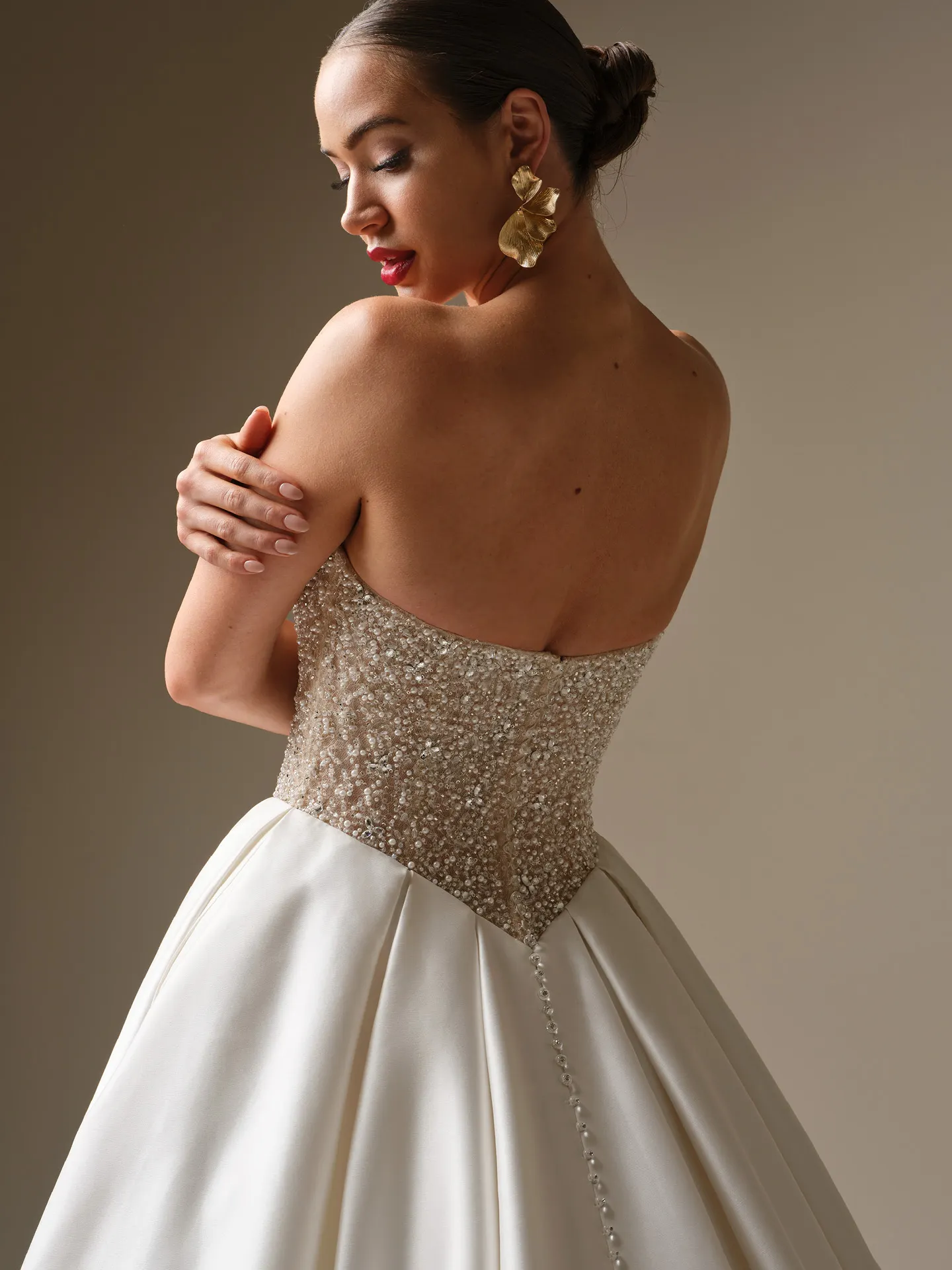 Sottero and Midgley Dmara beaded bodice satin ballgown, back view.
