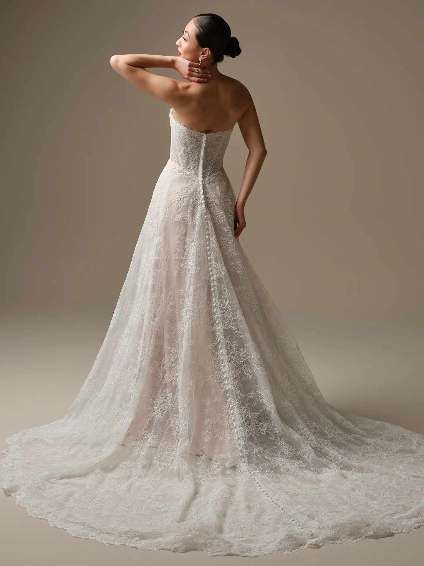 Sottero and Midgley Granger A-Line lace wedding dress, back view.