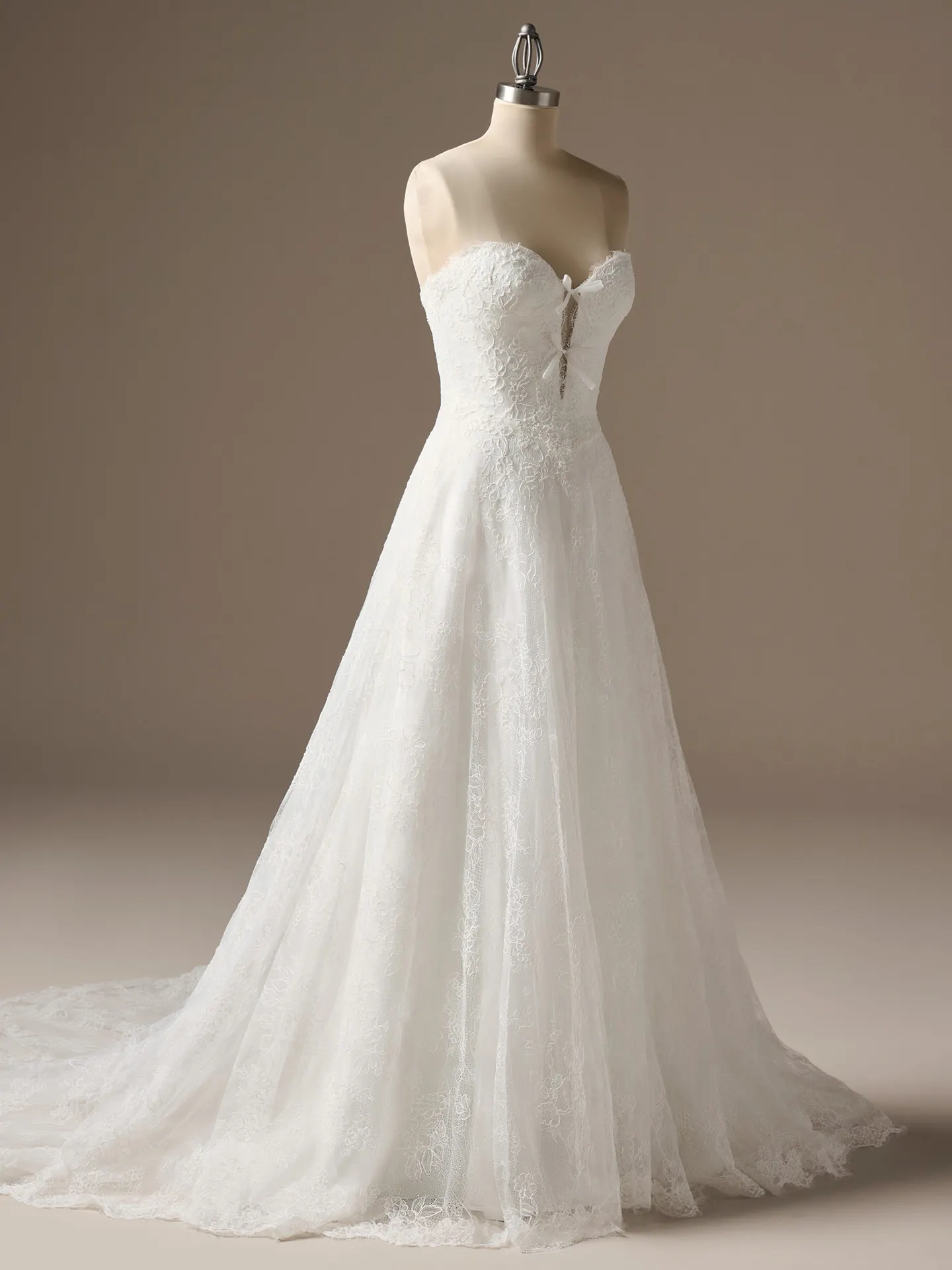 Sottero and Midgley Granger, front view, lace A-line wedding dress on mannequin.