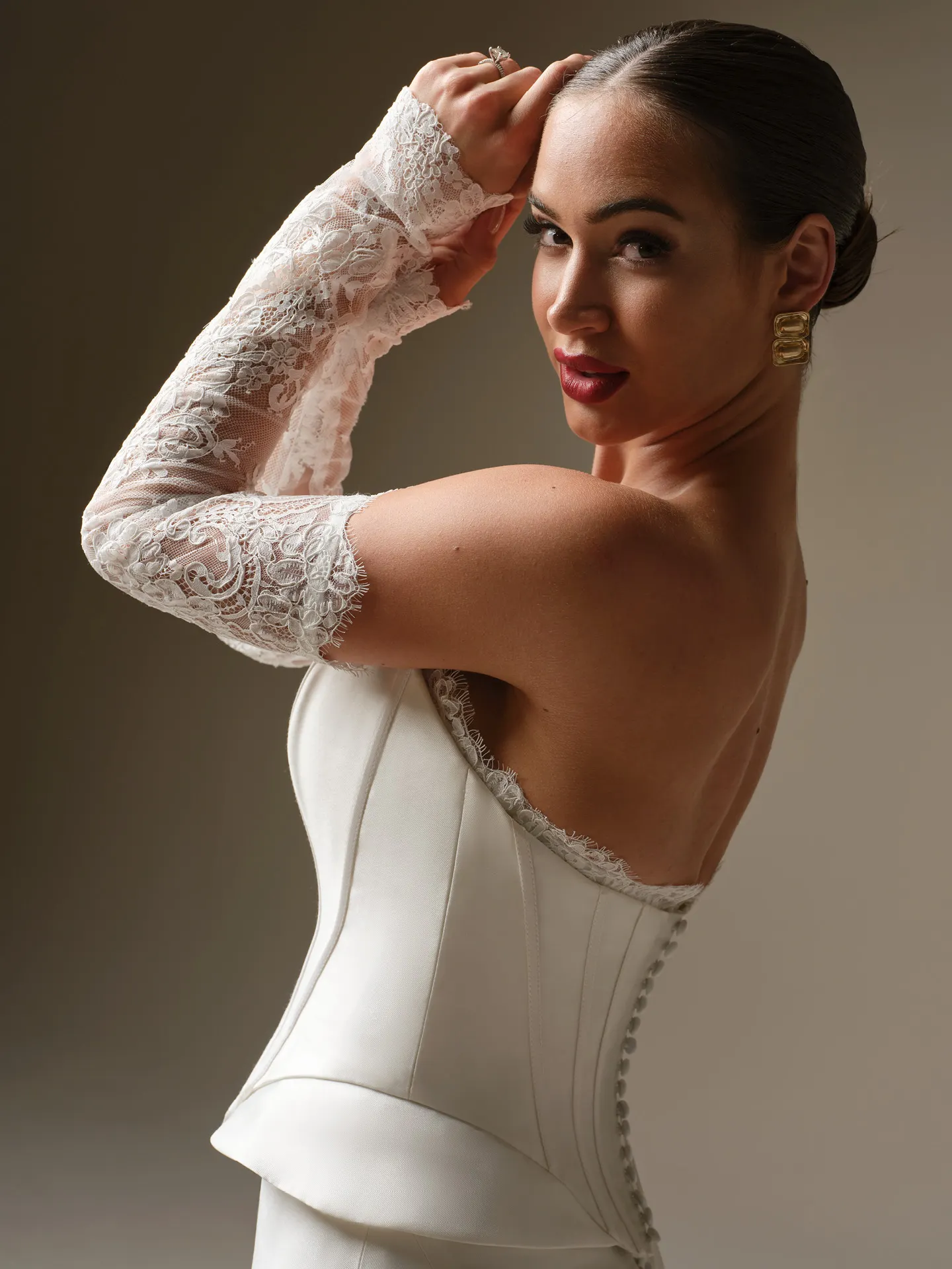 Sottero and Midgley Lassen Marie, side view lace sleeve corset wedding dress.