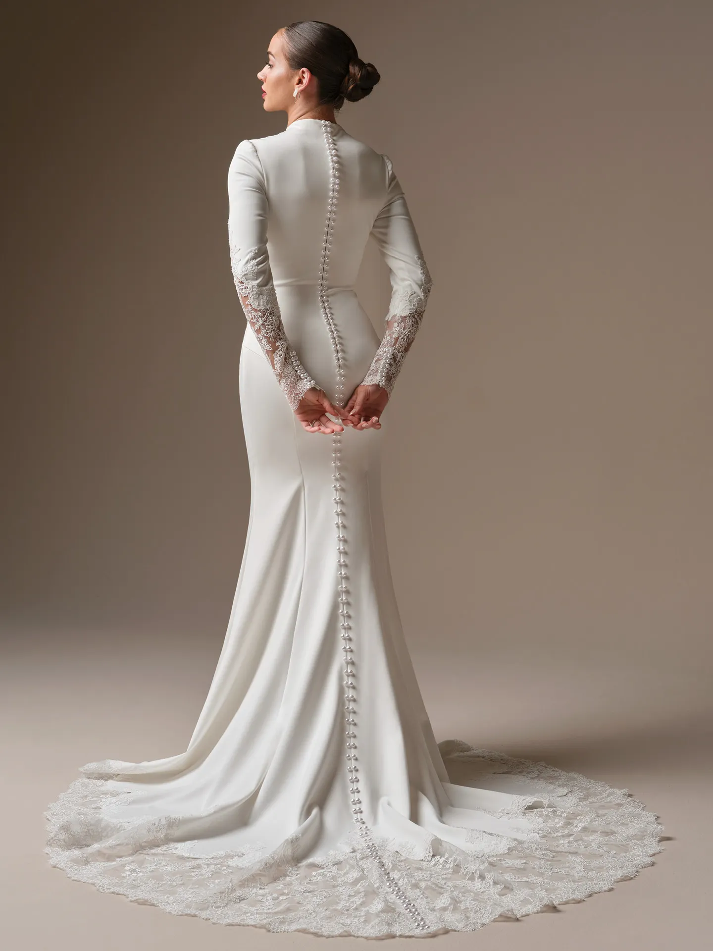 Sottero and Midgley Lovai, back view satin sheath lace train buttons.