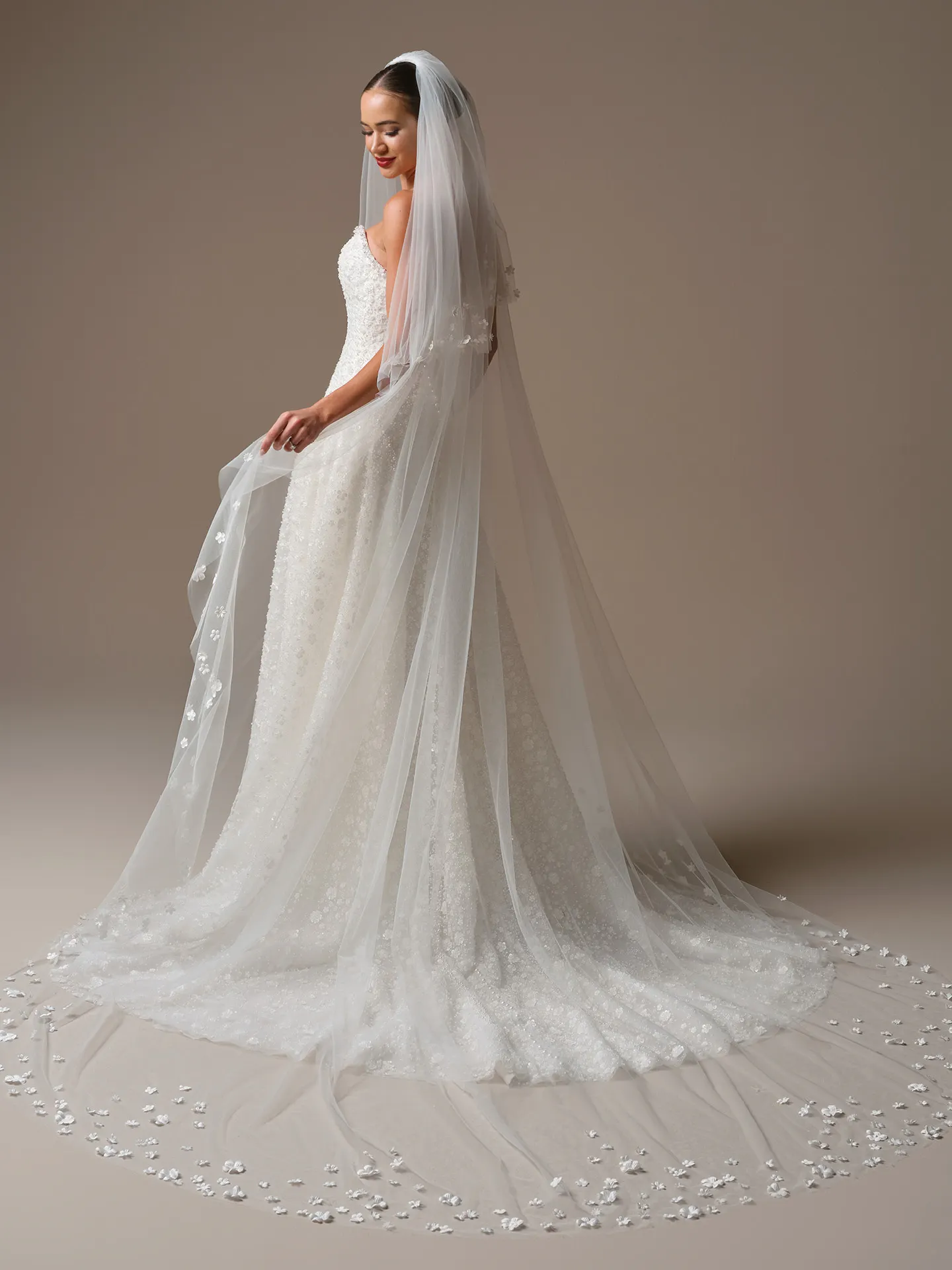 Sottero and Midgley Marceline A-line, side view with floral veil.