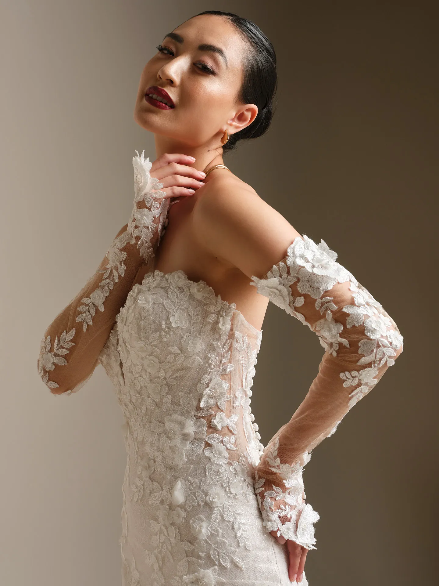 Sottero and Midgley Rashida lace fit-and-flare dress, side view.