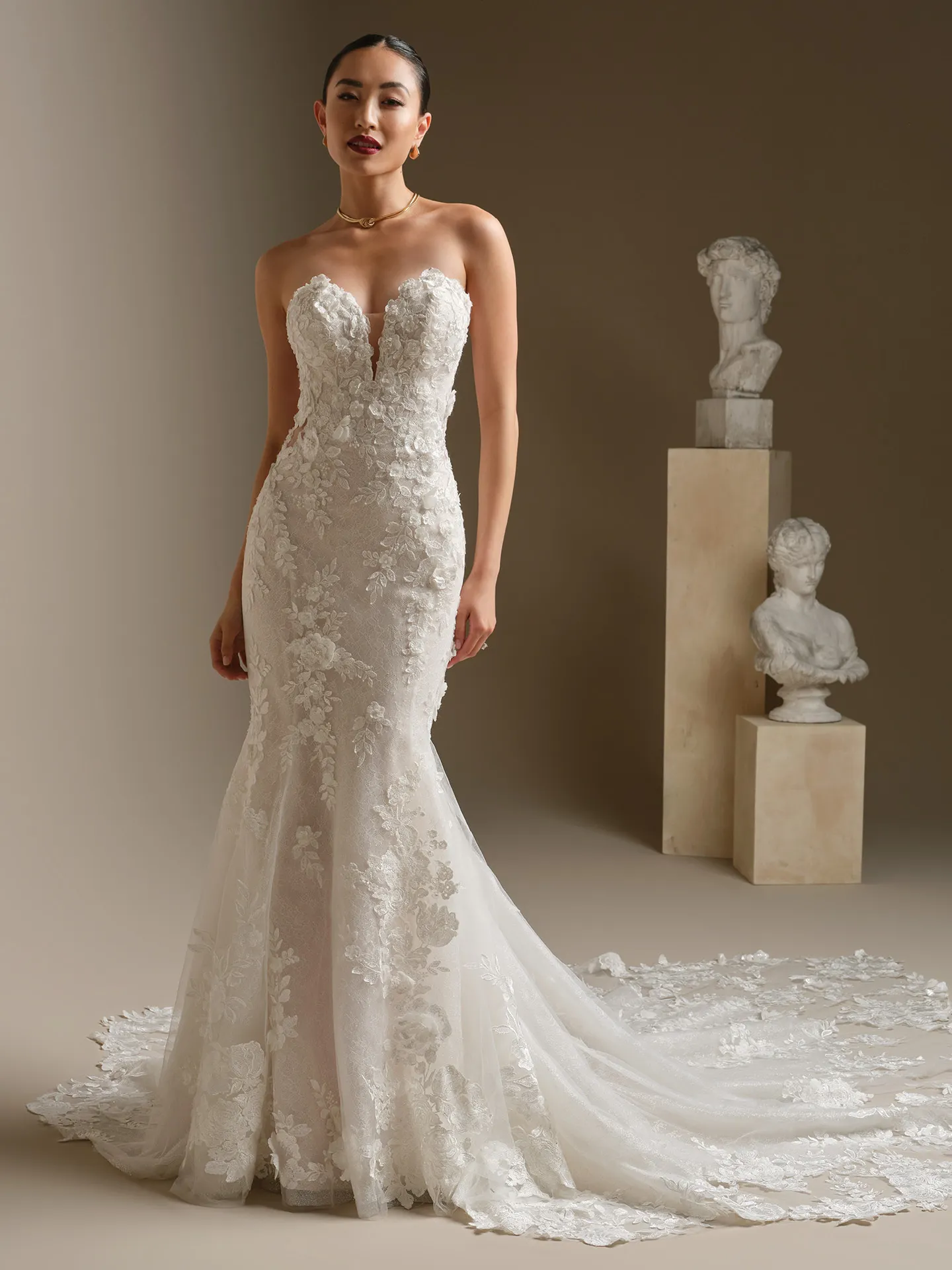 Sottero and Midgley Rashida, front view lace fit-and-flare wedding dress with long train.