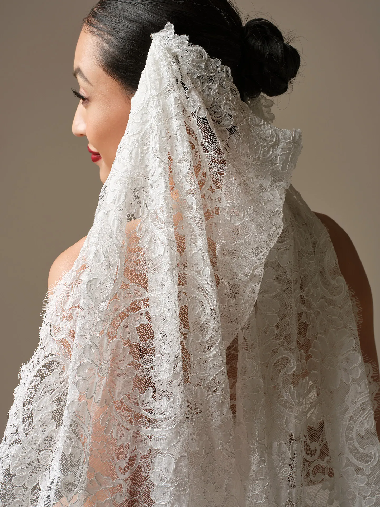 Sottero and Midgley lace veil detail,, side view.