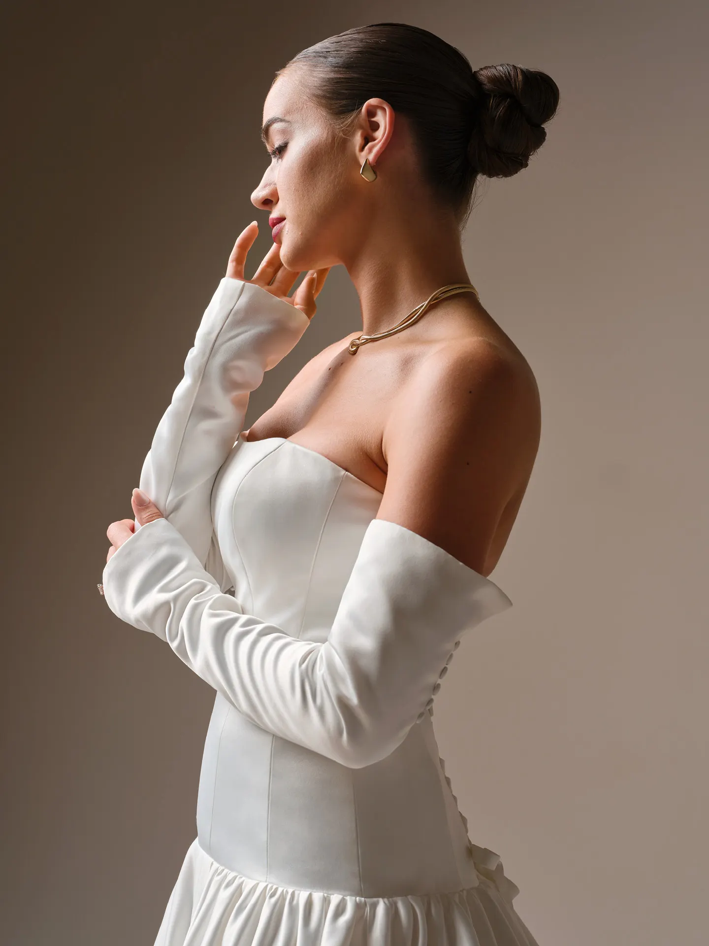 Sottero and Midgley Tokyo, side view strapless satin corset ballgown wedding dress.