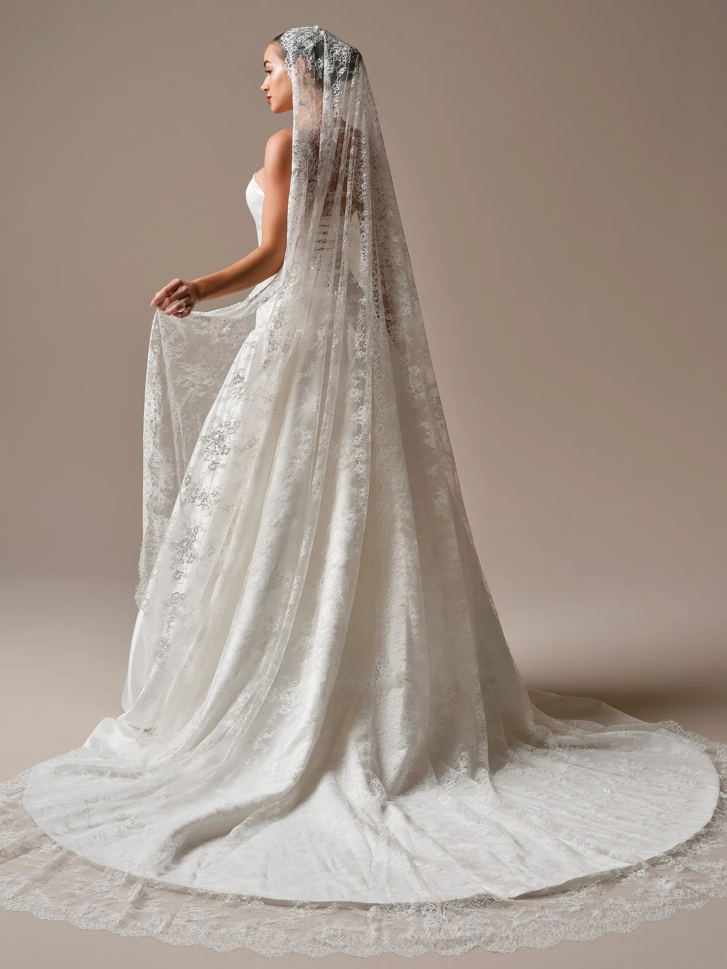 Sottero and Midgley Tokyo, side view ballgown with veil.