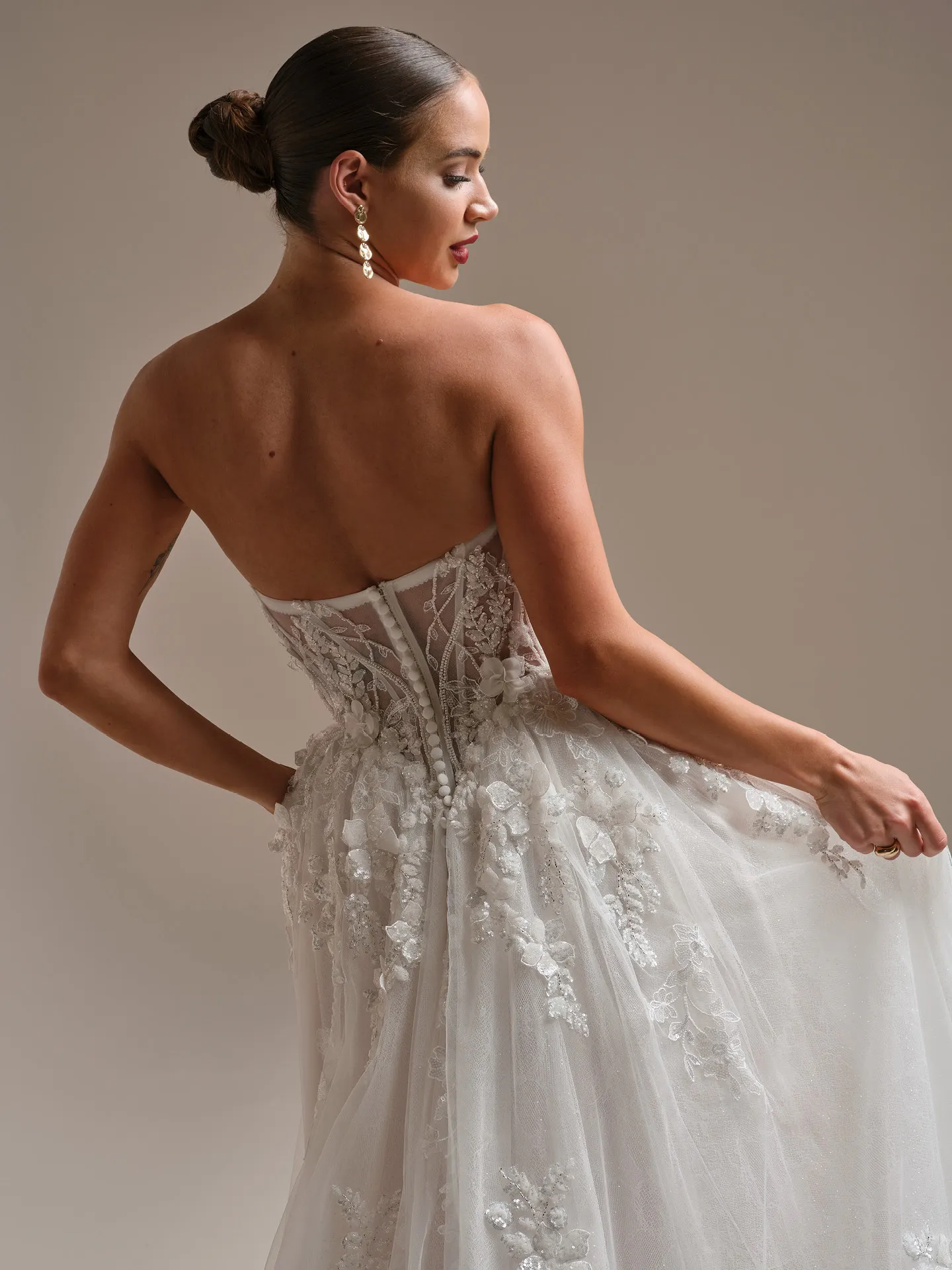 Sottero and Midgley Twilight Lane, back view with 3-D beaded lace A-line design.