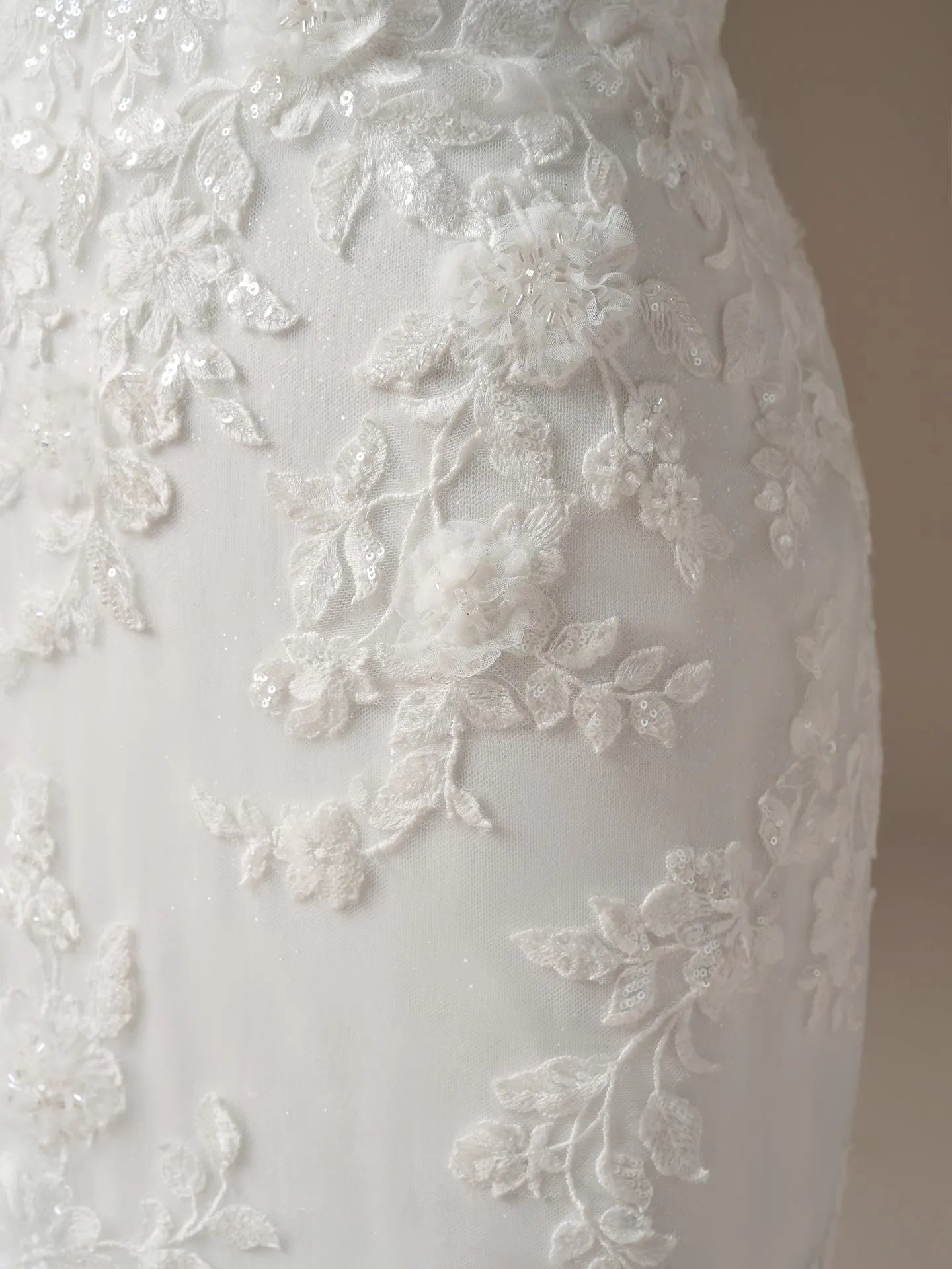 Sottero and Midgley West beaded lace fit-and-flare detail view.