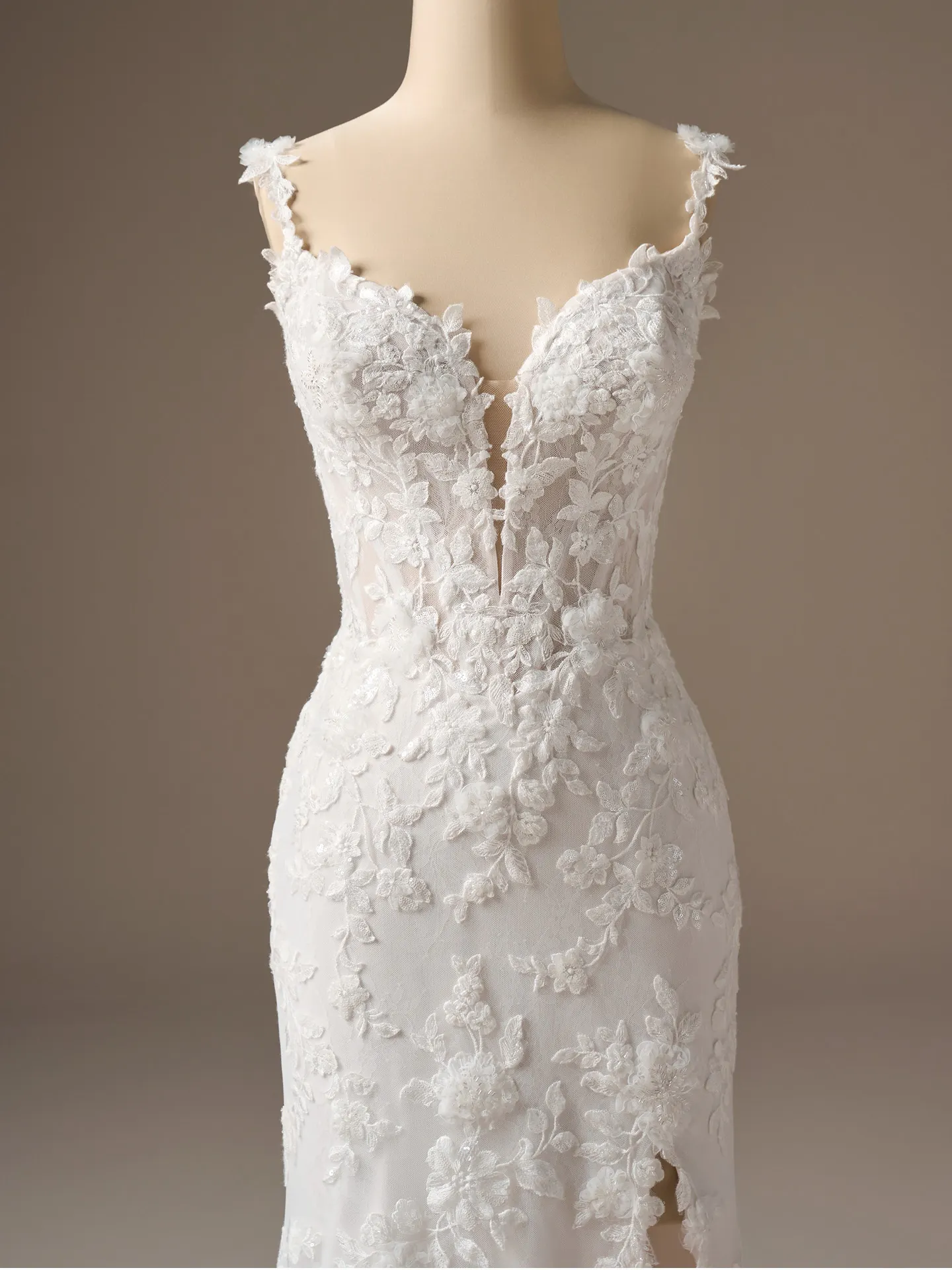 Sottero and Midgley fit-and-flare beaded lace wedding dress, front view.