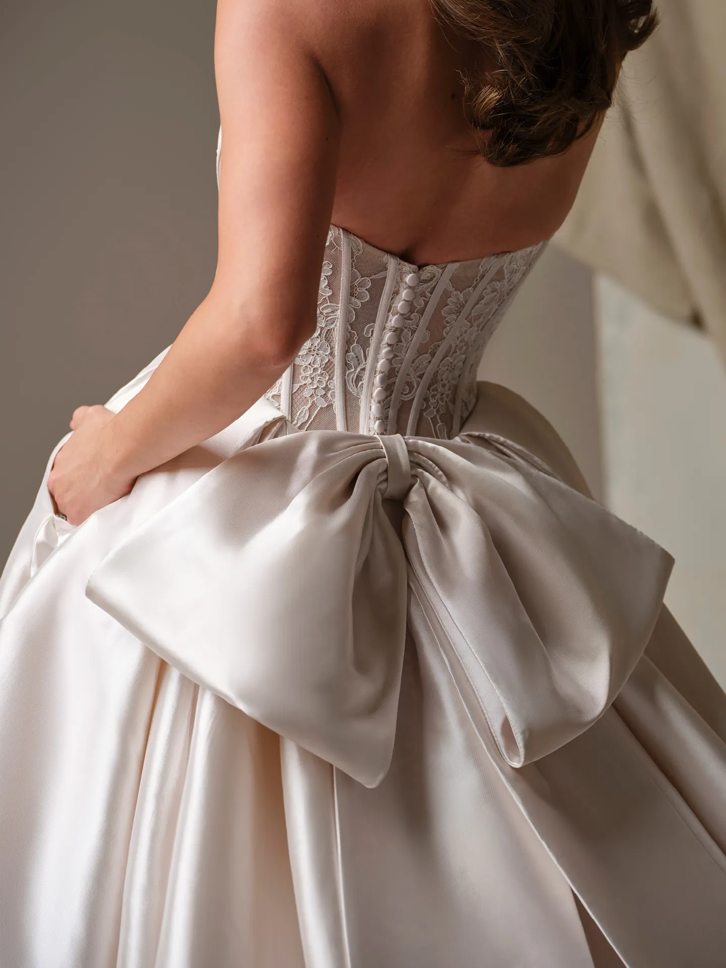 Maggie Sottero Ashland detachable bow, front view.