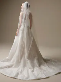 Essentials Edit - Soft plain tulle adds timeless romance and elegance to complete your bridal ensemble with this Maggie Sottero veil.