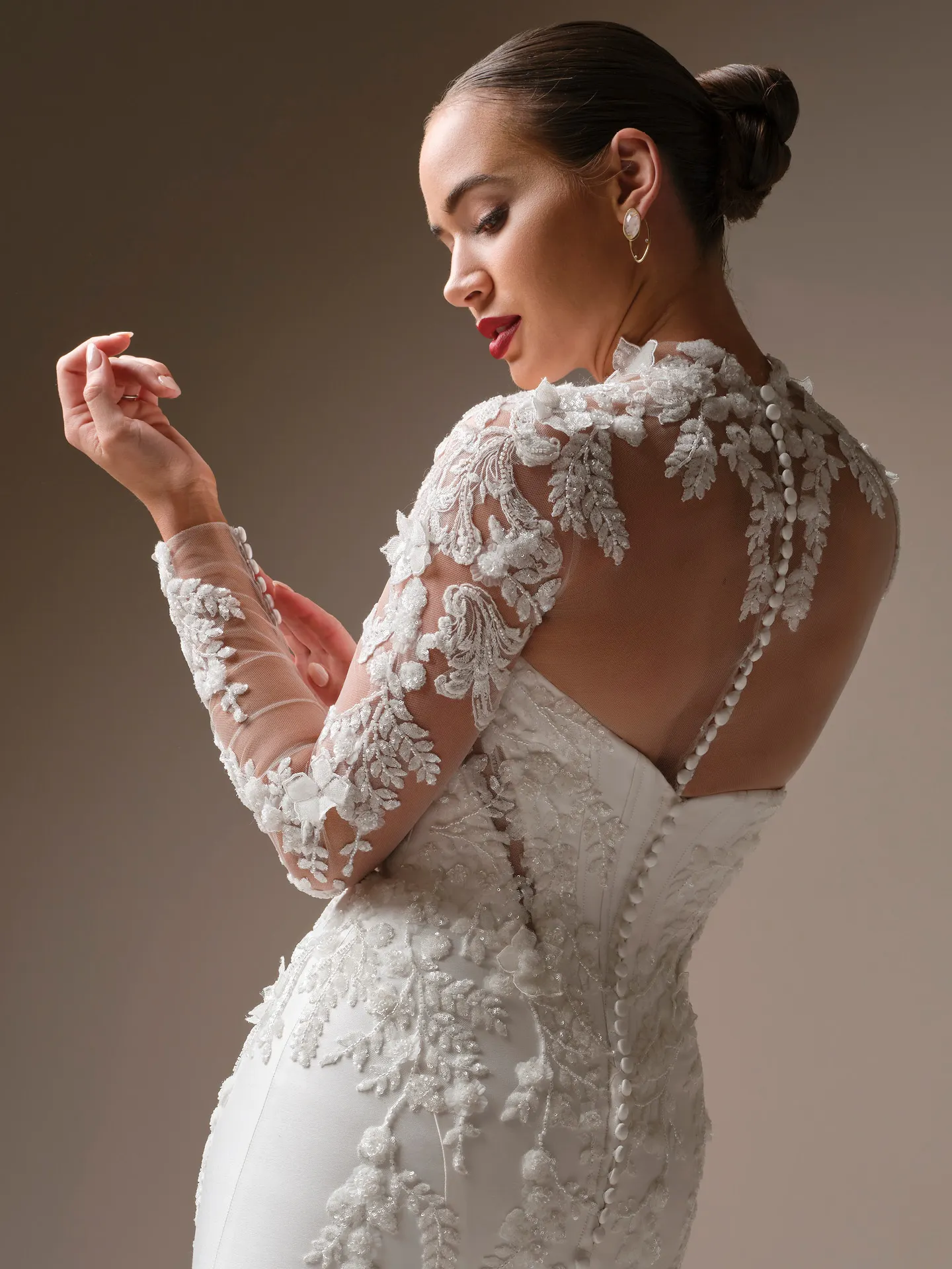 Maggie Sottero Burke lace bridal jacket, side view.
