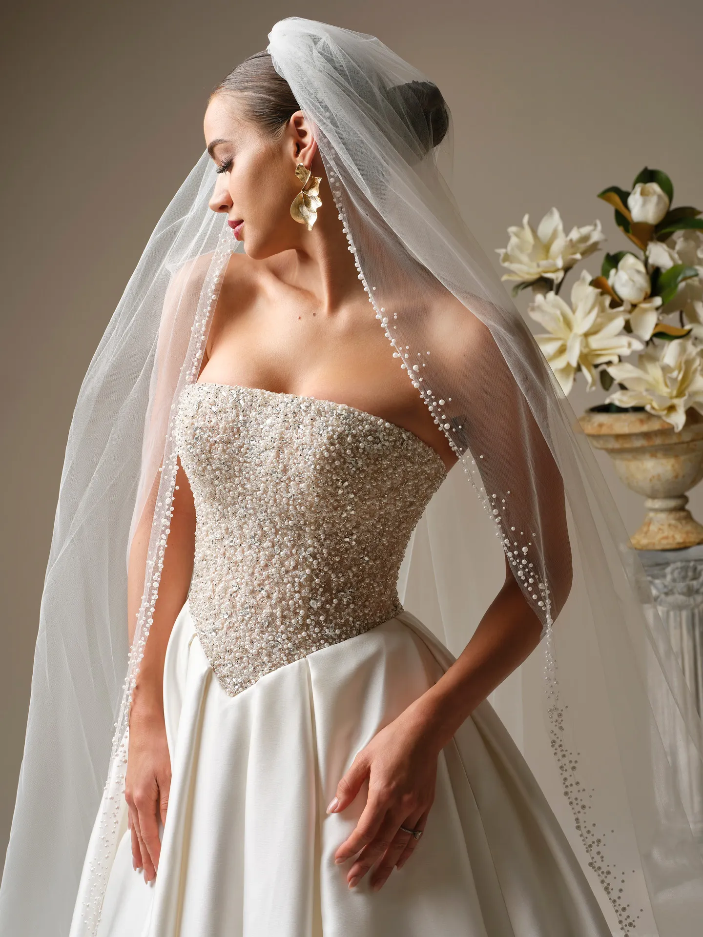 Sottero and Midgley, front view dress with pearl edge cathedral veil.