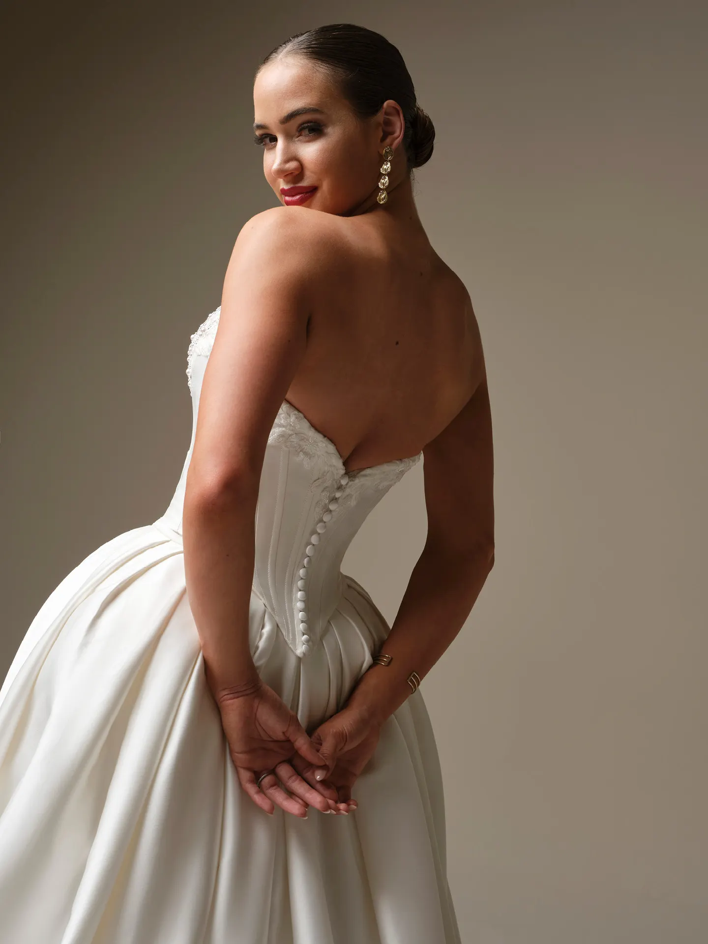 Sottero and Midgley Kalinda satin ballgown, back view.