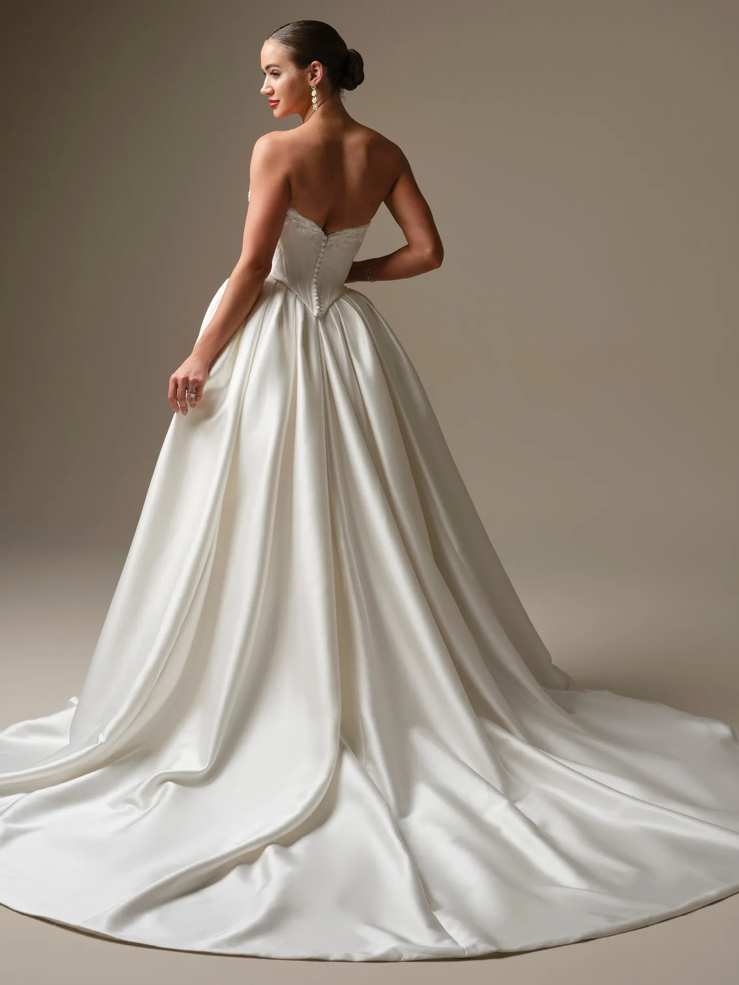 Sottero and Midgley Kalinda satin wedding dress, back view with train.
