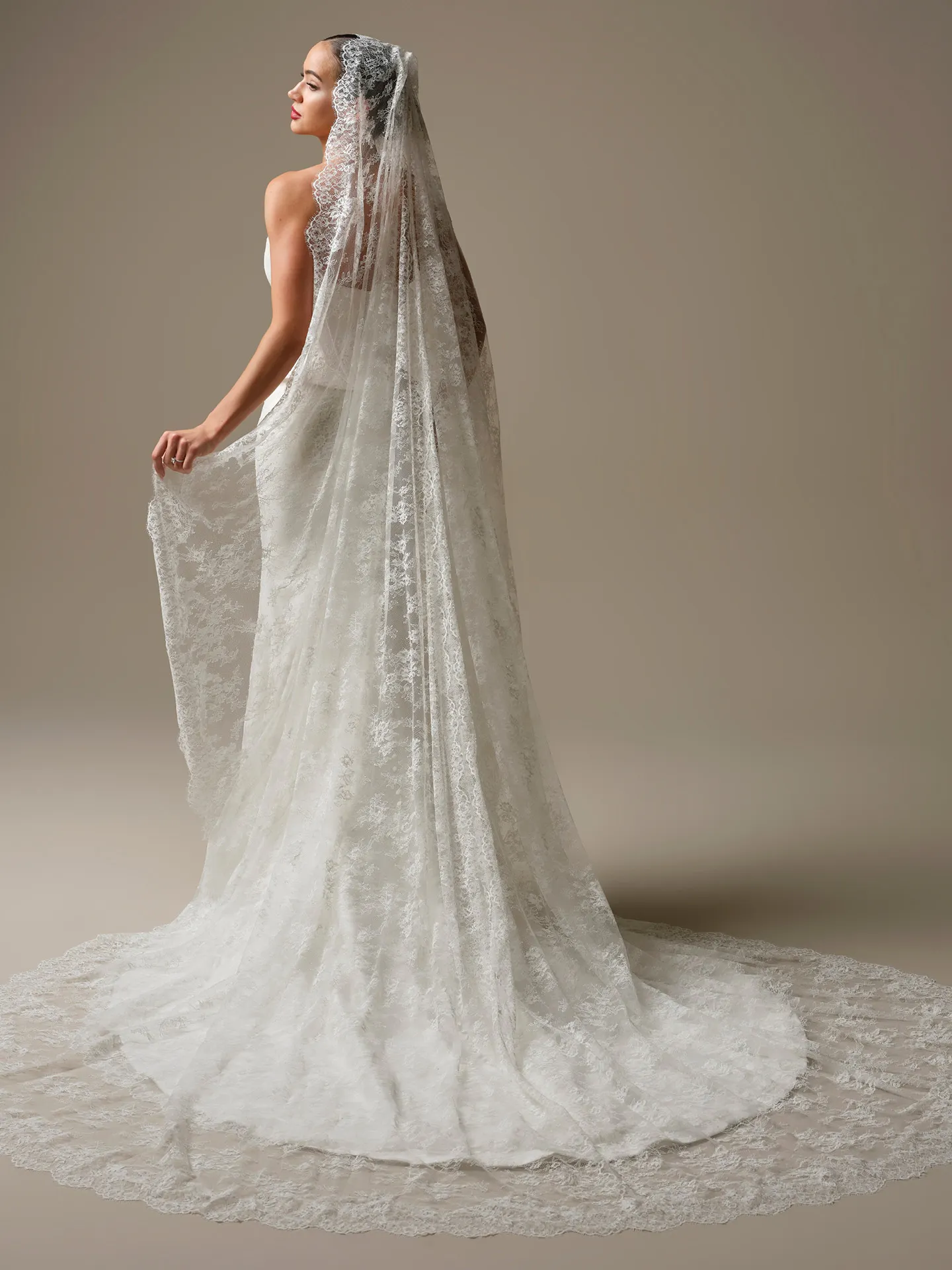 Sottero and Midgley Lassen, side view, cathedral veil with Chantilly lace.