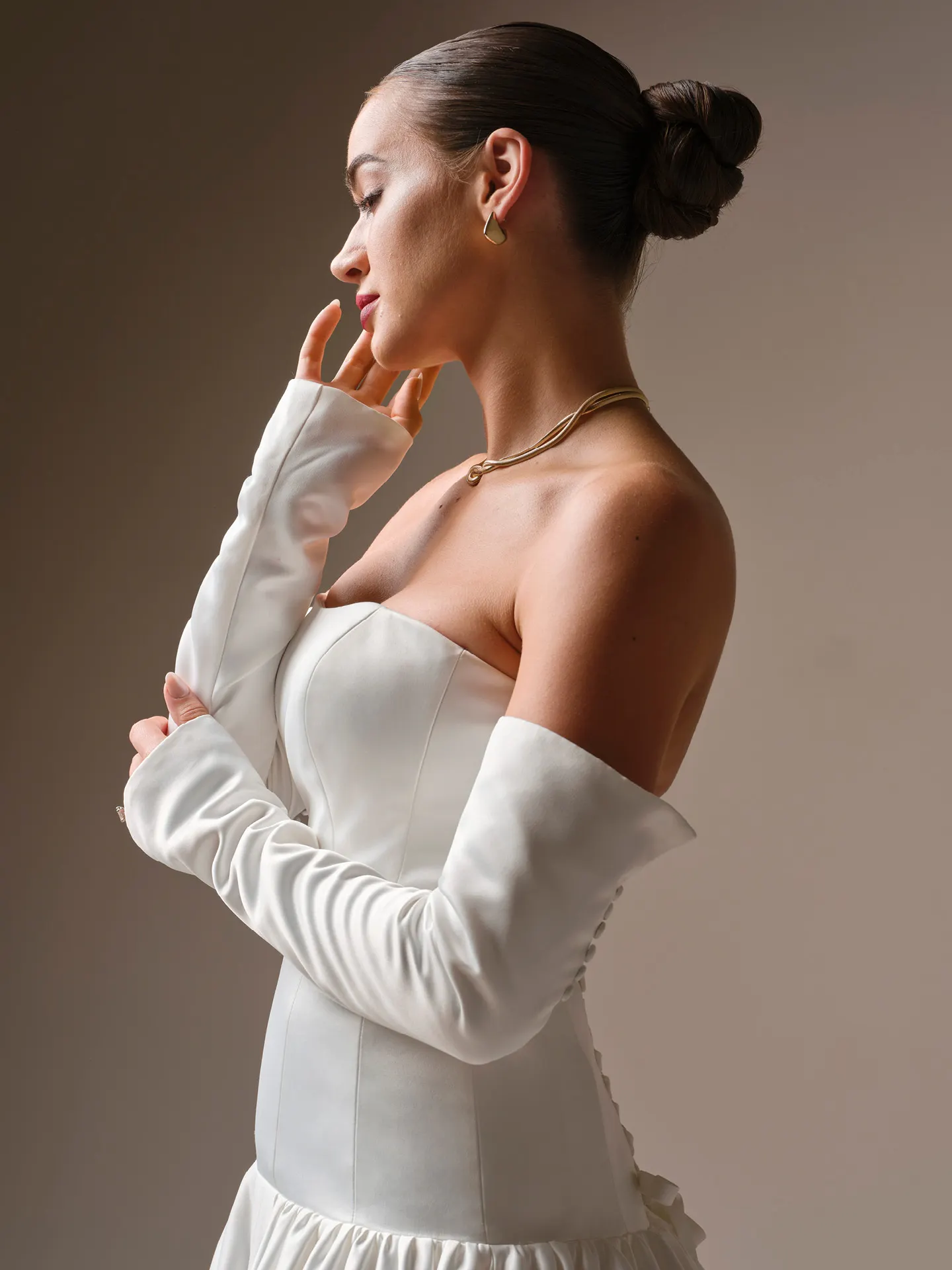 Sottero and Midgley Tokyo, side view fitted satin sleeves with buttons.