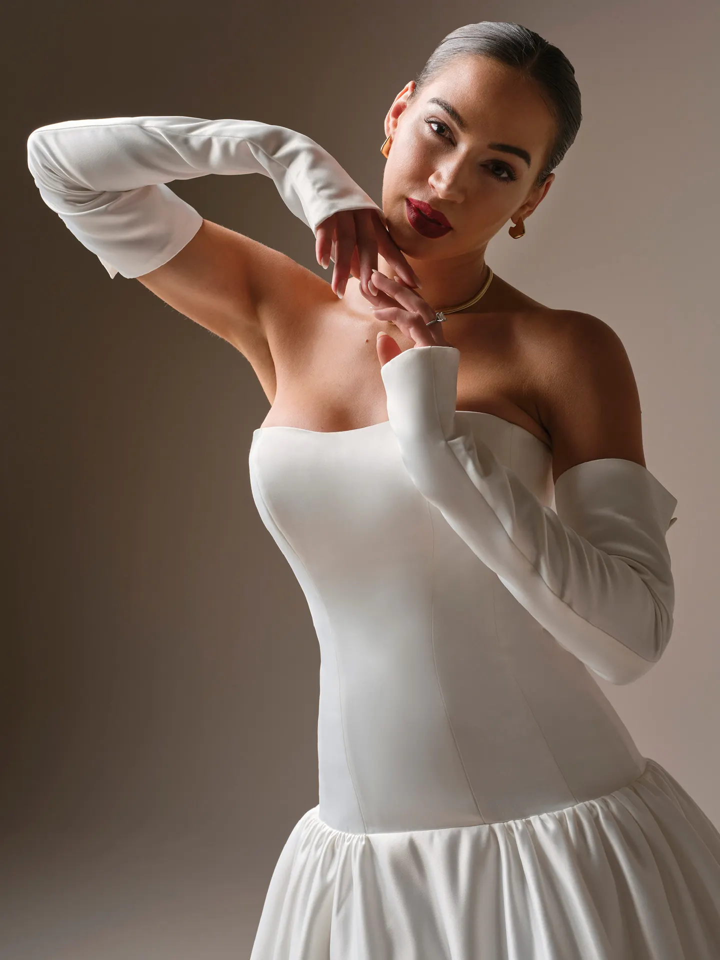 Sottero and Midgley Tokyo, front view fitted satin sleeves with buttons.