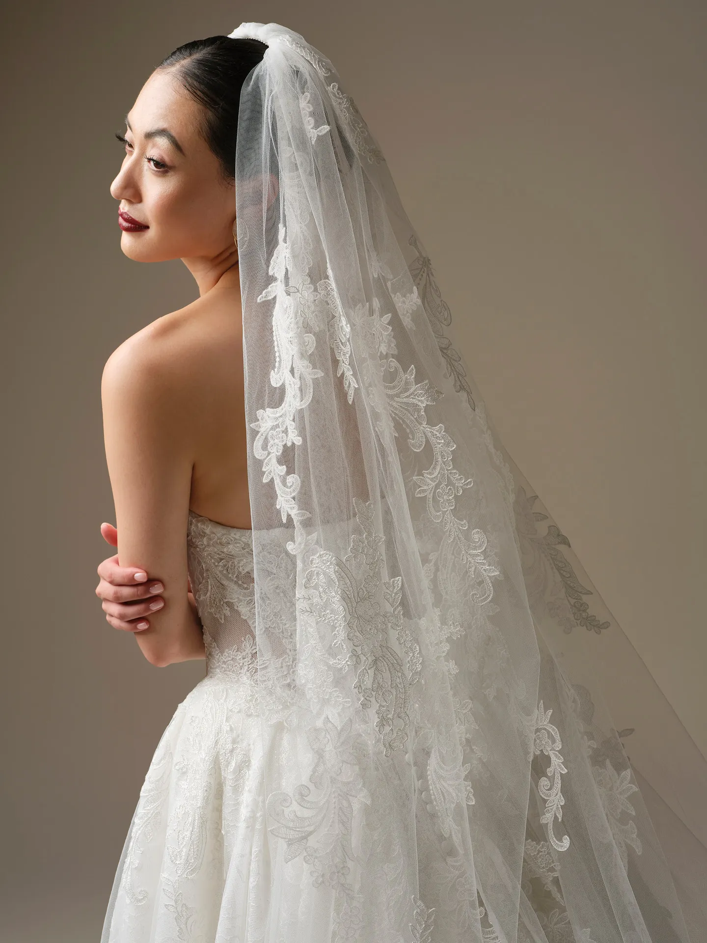 Sottero and Midgley Zulani Royal veil with sequin lace, side view.