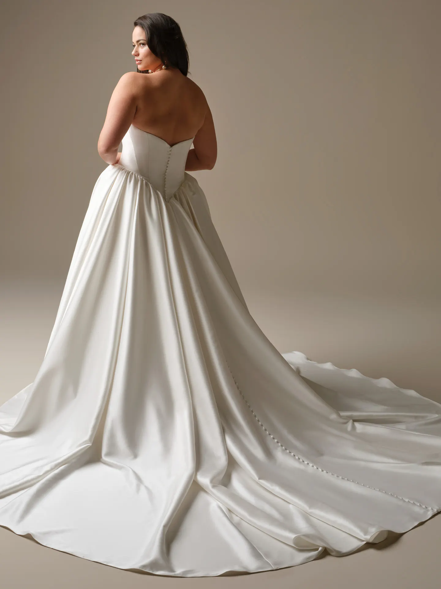 Maggie Sottero Hudson strapless draped bodice ballgown, back view.