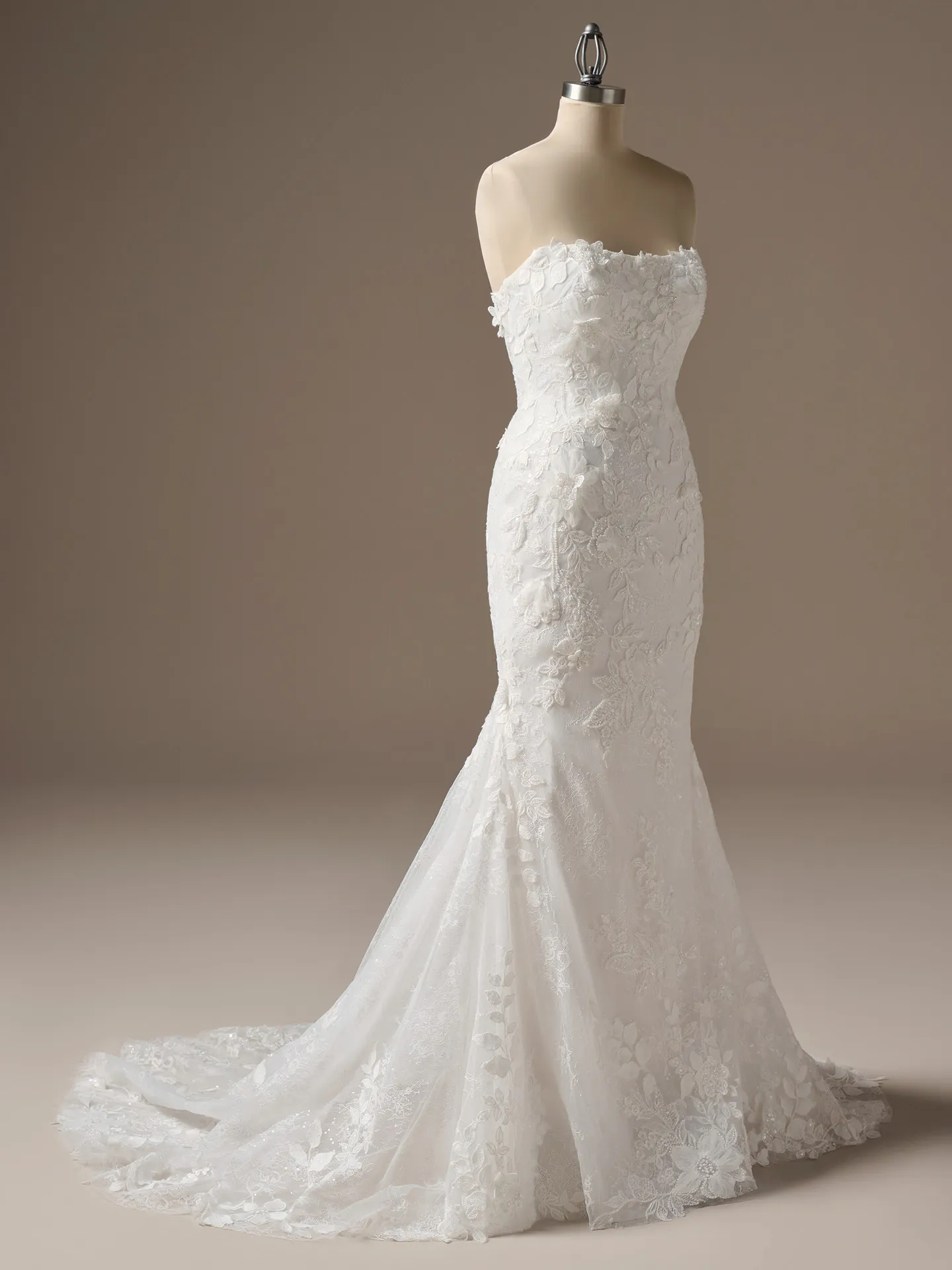 Maggie Sottero Laurie fit-and-flare wedding dress on mannequin, front view, lace detail.