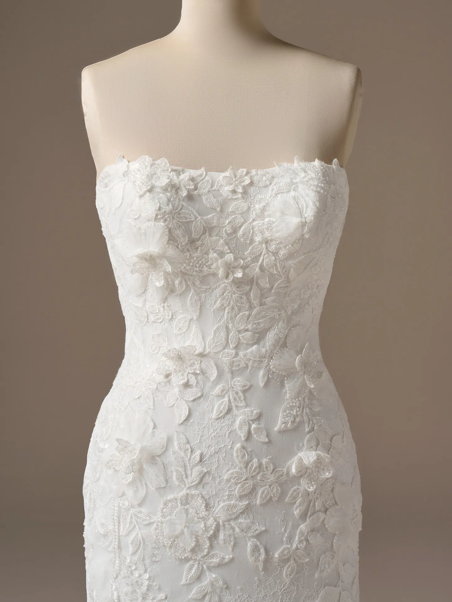 Maggie Sottero Laurie floral lace bodice close-up.