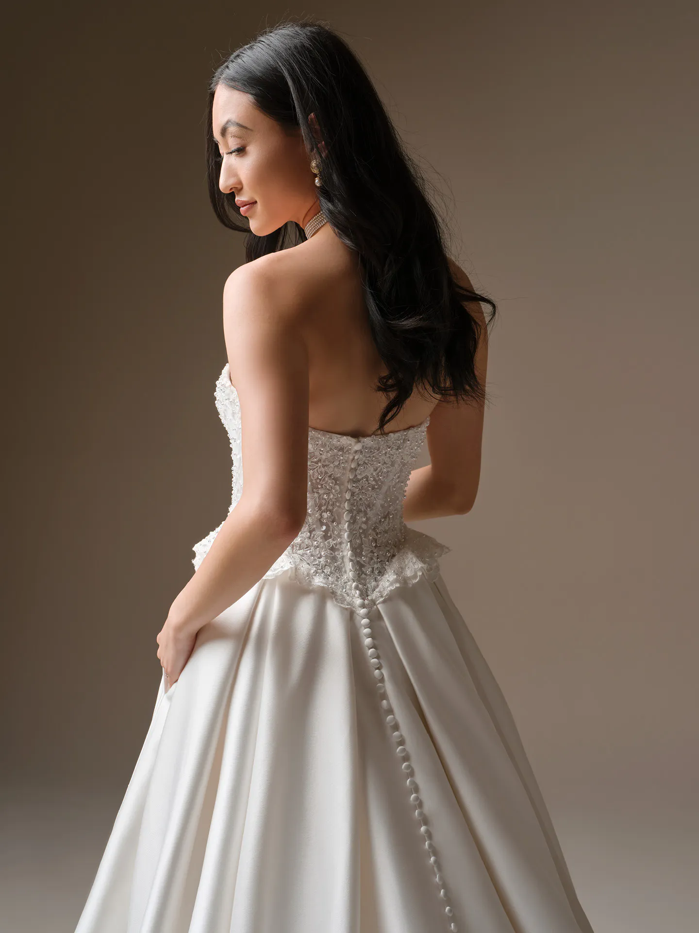 Maggie Sottero London, back view strapless beaded lace ballgown wedding dress.