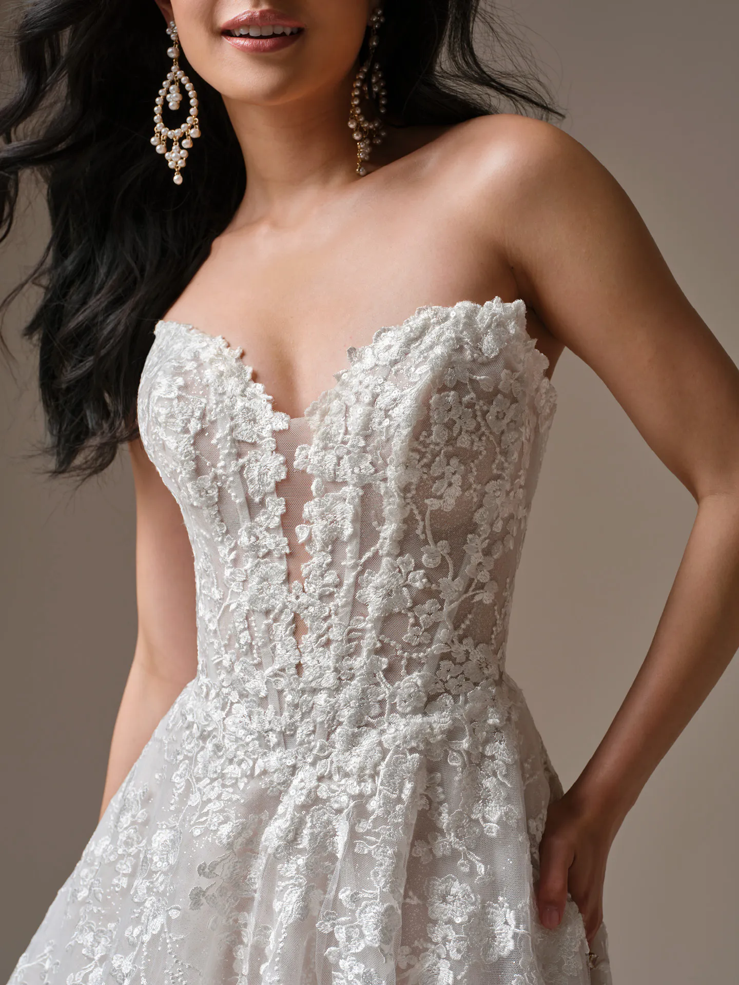 Maggie Sottero Memphis, front view lace A-Line wedding dress with plunging neck.