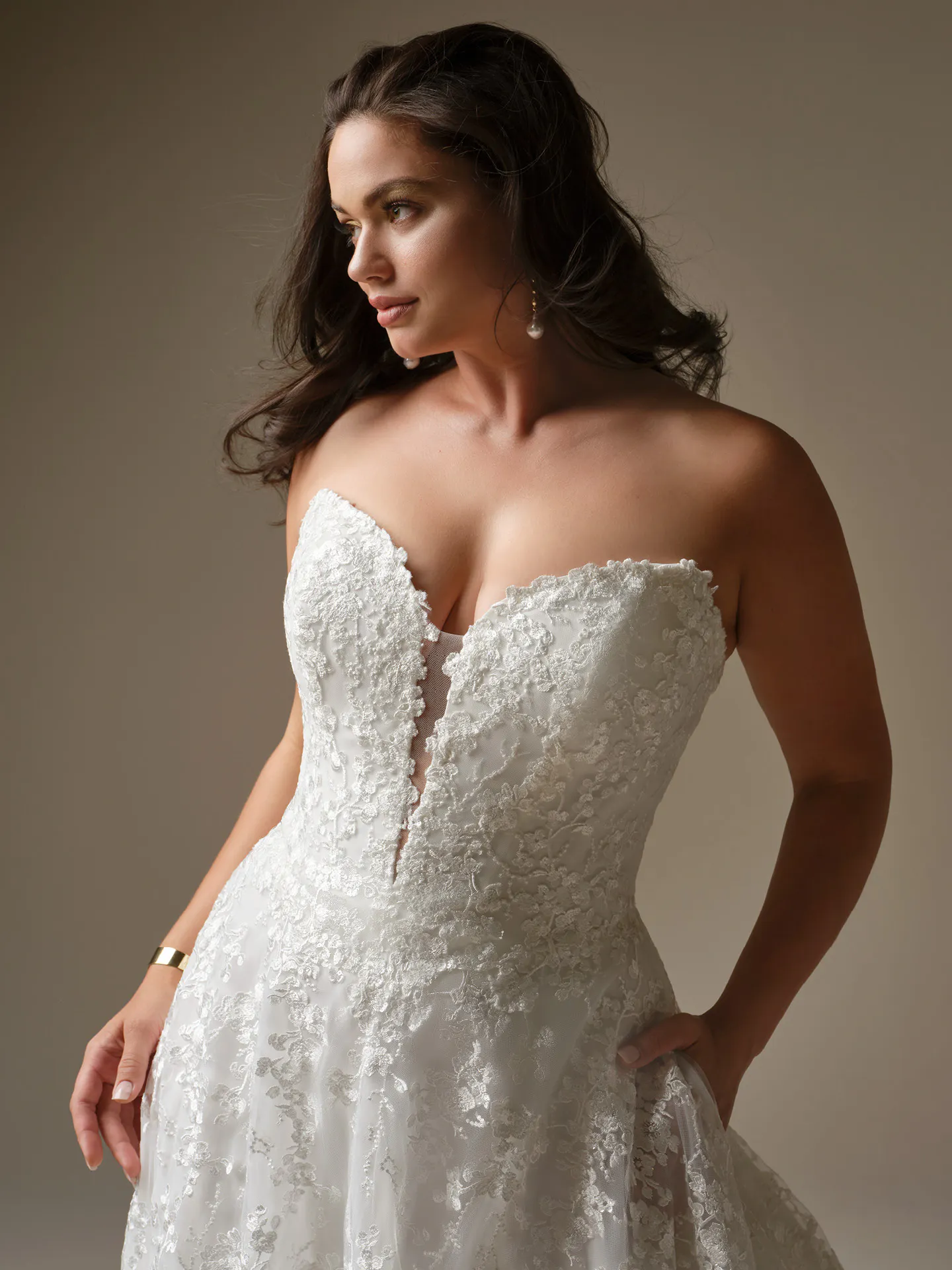 Maggie Sottero Memphis A-Line dress, front view, plunging neckline, lace detail.