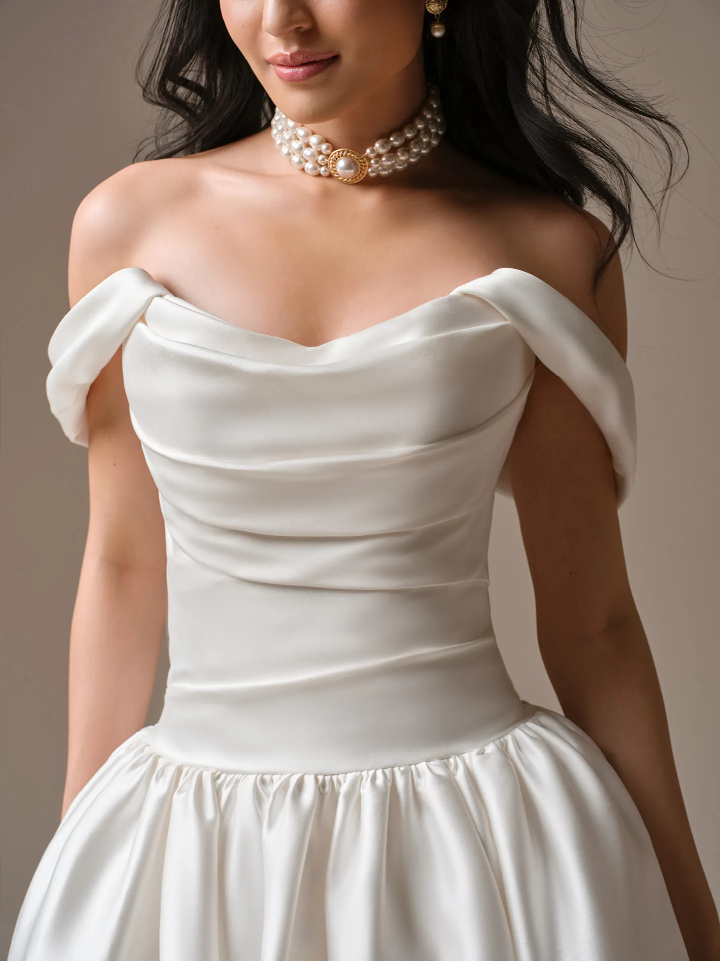 Maggie Sottero Sylvana draped satin A-Line, front view.
