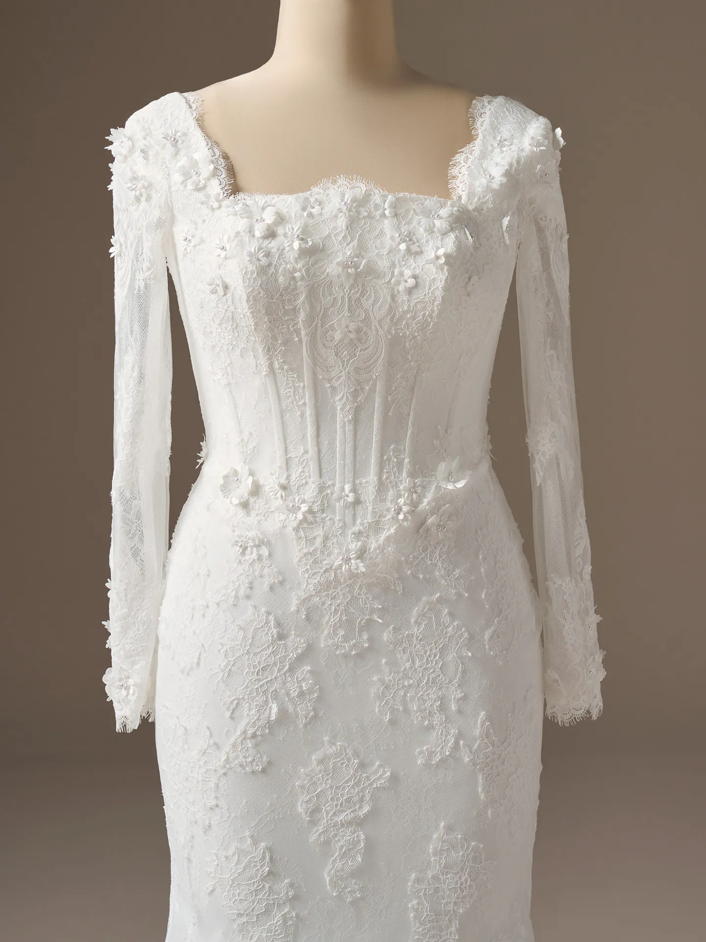 Maggie Sottero Takera 3-D floral lace mermaid wedding dress front view Maggie Sottero.