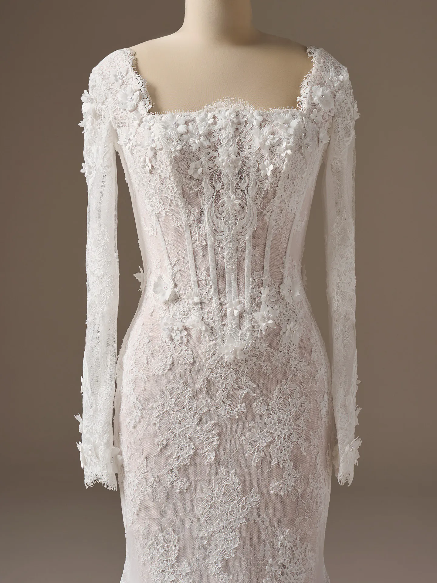 Maggie Sottero Takera 3-D floral lace mermaid wedding dress front view Maggie Sottero.